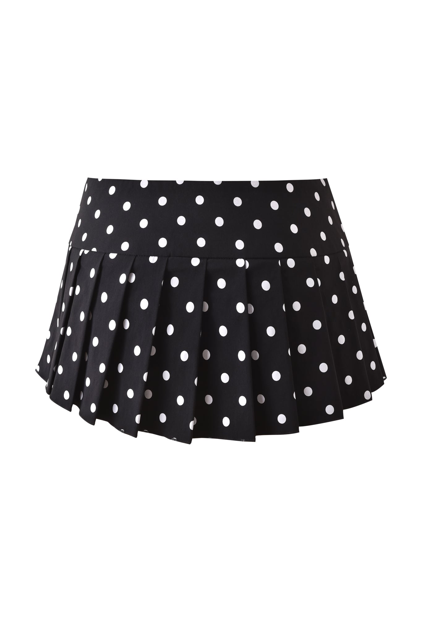 The REMINI SKORT - BLACK POLKADOT by I.AM.GIA is a chic mini skort with classic pleats, featuring playful white polka dots on a black low-rise design.