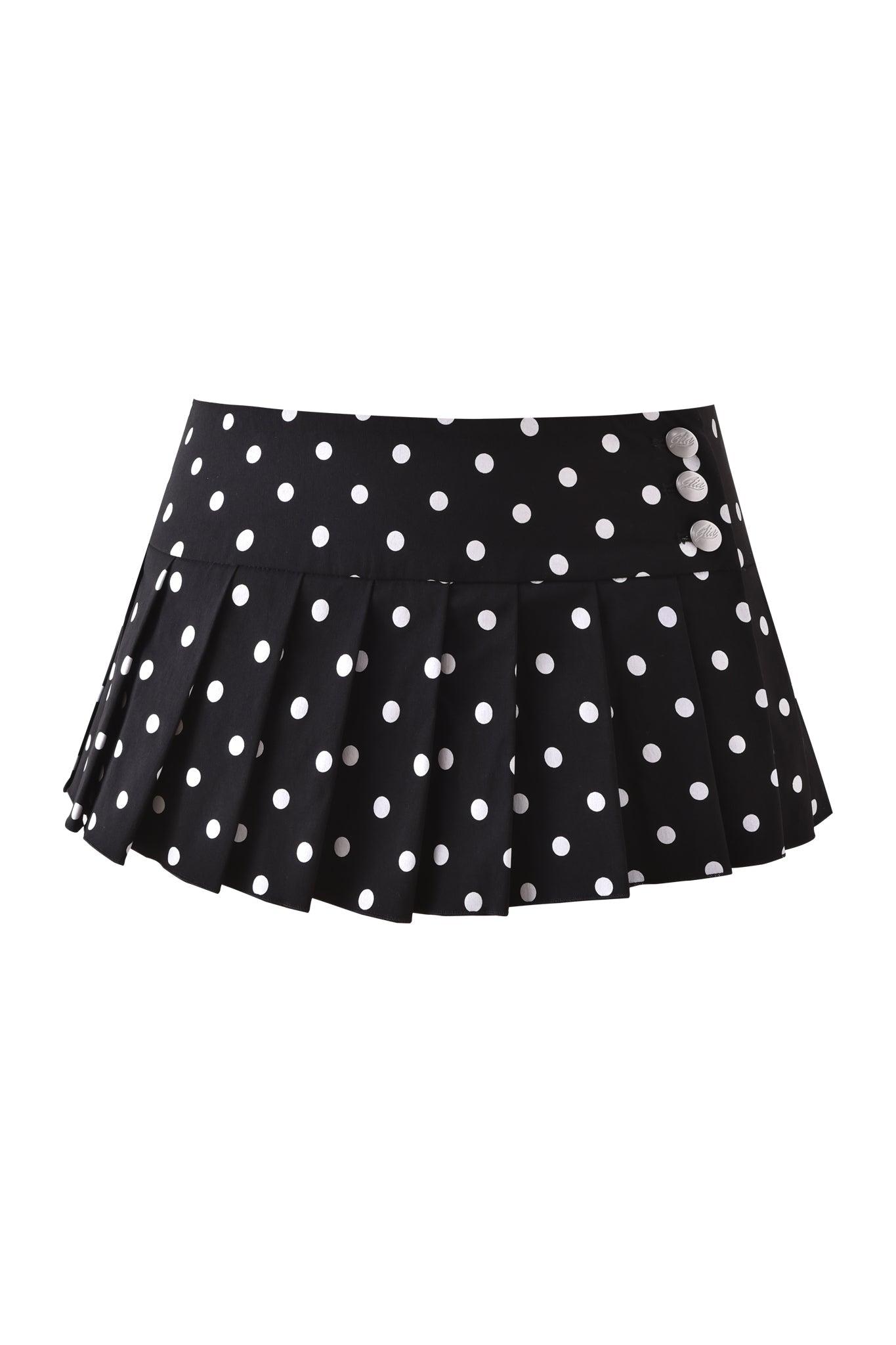 The REMINI SKORT - BLACK POLKADOT by I.AM.GIA is a black pleated micro mini skort featuring white polka dots and two white buttons on the waistband.