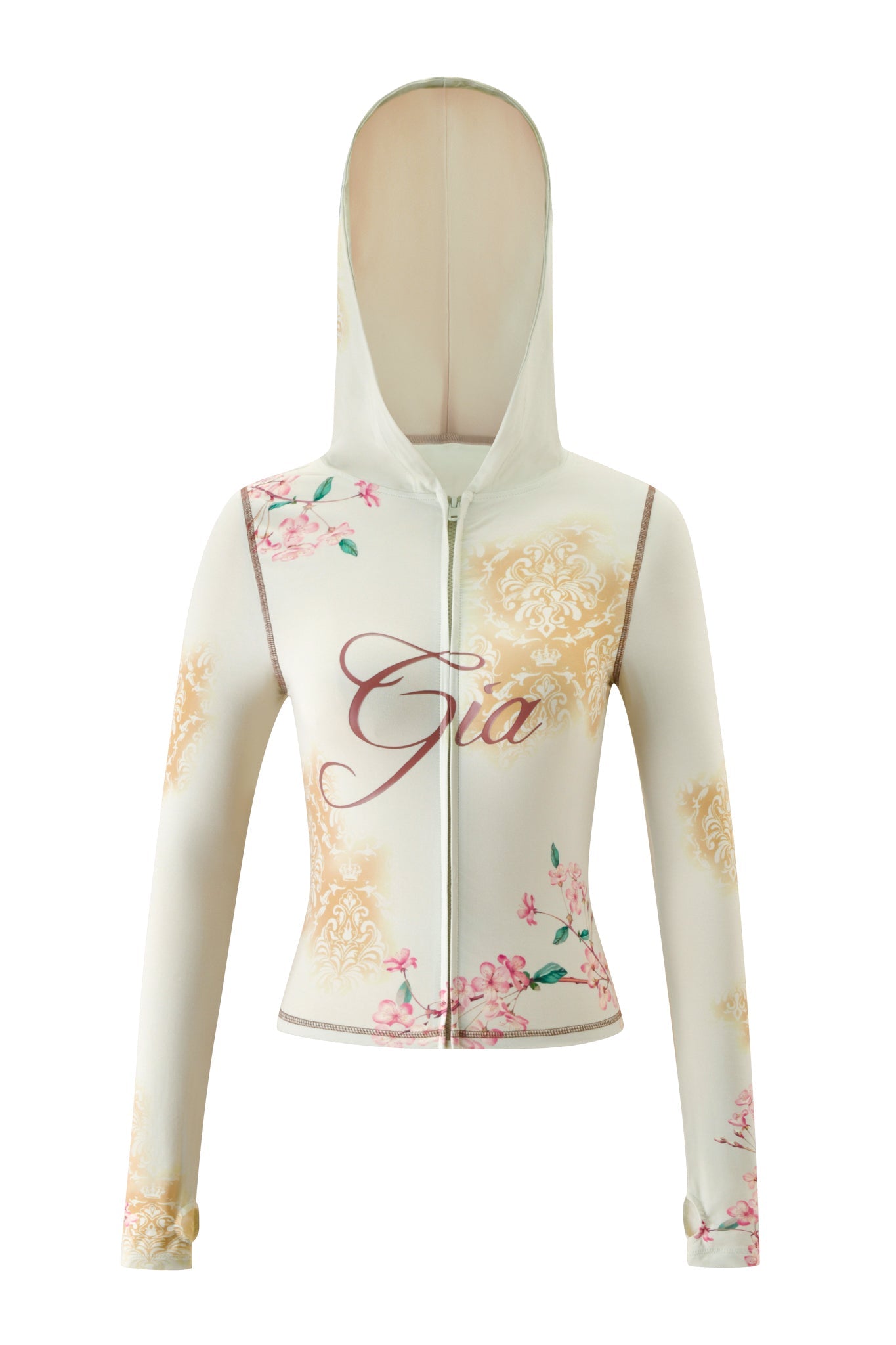 A cream-colored zip-up BLARE HOODIE - BLOSSOM by I.AM.GIA featuring a hood, floral and baroque pattern accents, and “Gia” written in script across the chest.