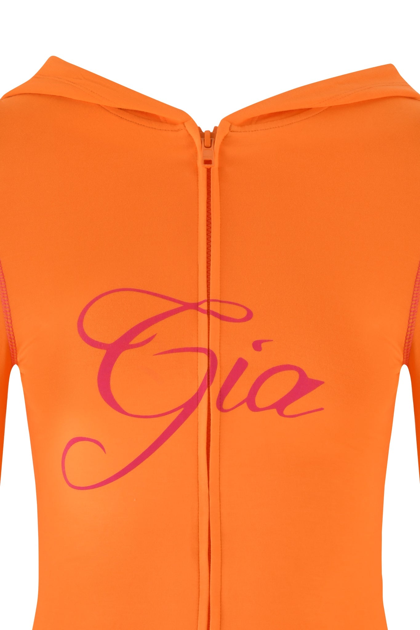 Close-up of the BLARE HOODIE - ORANGE by I.AM.GIA, a stretchy bamboo bodycon hoodie. It features a central zipper and "Gia" in large pink letters on the front.