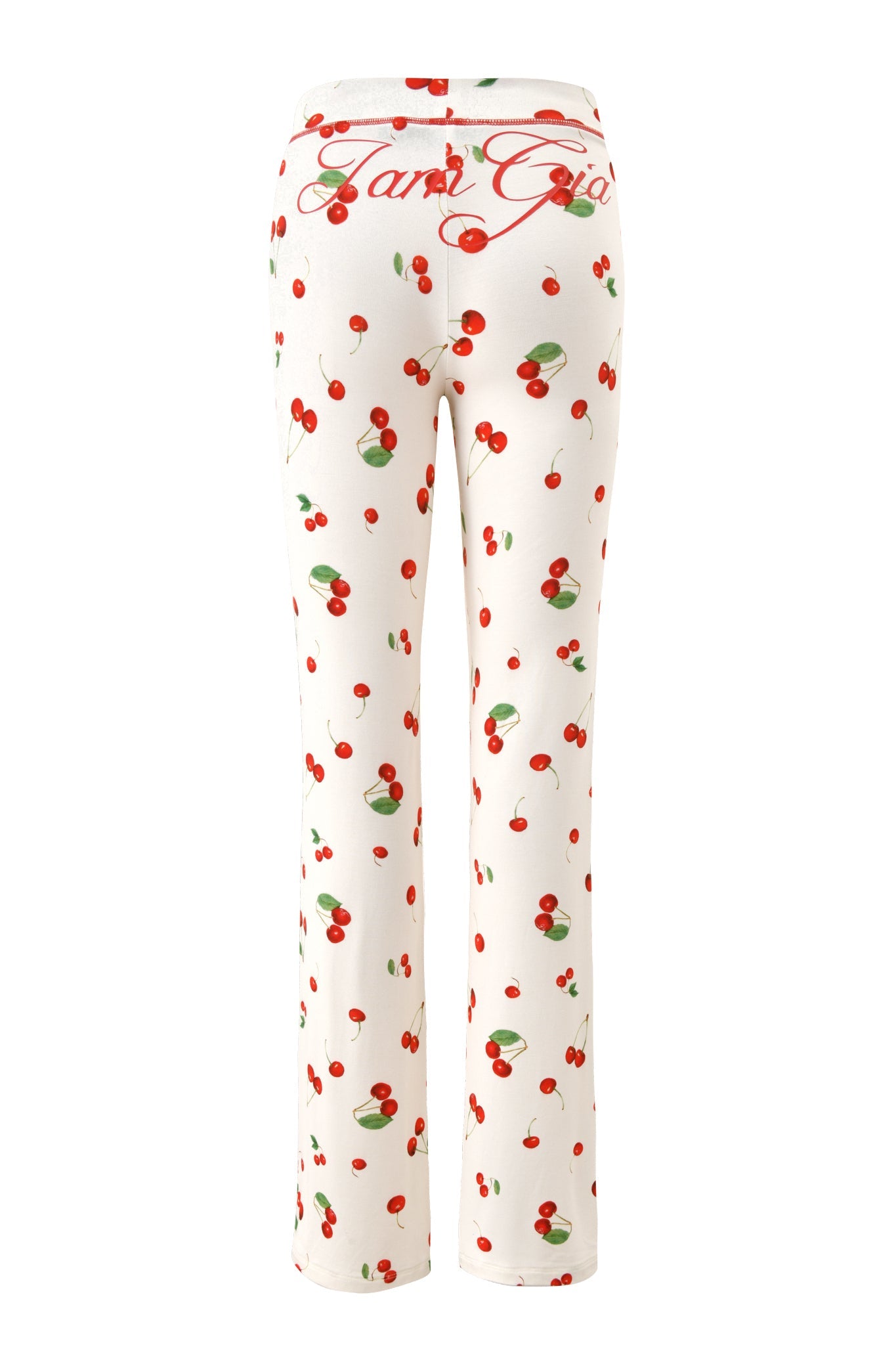 The I.AM.GIA BLARE TRACKPANT - CHERRY ON TOP features a cherry print and "Cami Gio" in red cursive on the back waistband, crafted from soft bamboo fabric, shown from the back.