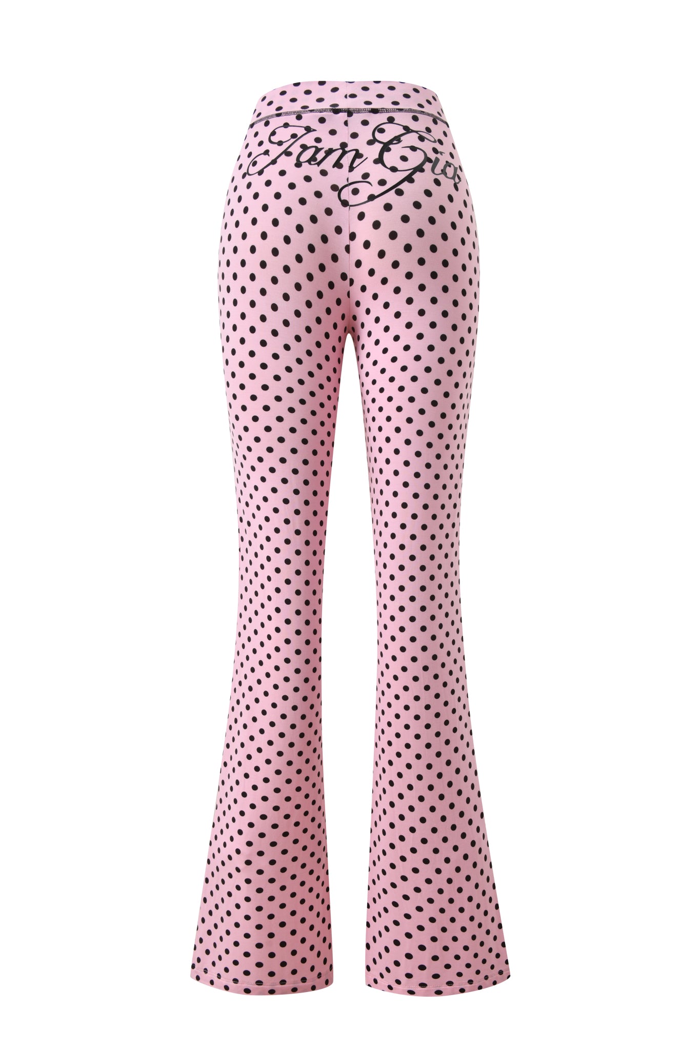 The BLARE TRACKPANT - PINK POLKA DOT by I.AM.GIA features a high-waisted fit, black polka dots, “Fairy Girl” script on the waistband and upper back, and the signature I.AM.GIA logo for a bold, playful look.