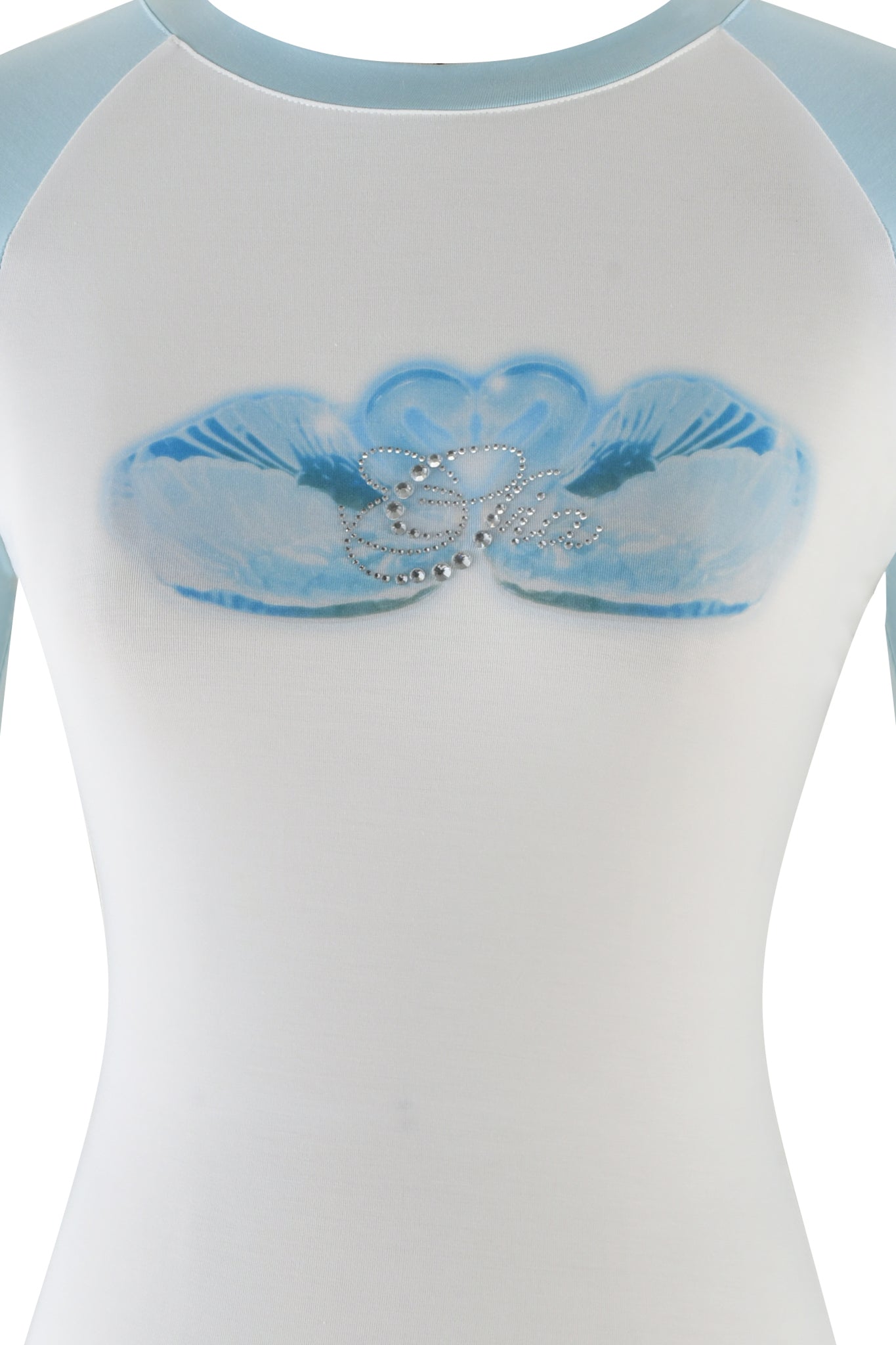 The CAMELIA RAGLAN TOP by I.AM.GIA features a white design with two blue butterflies on the chest and a rhinestone Gia logo underneath. The bamboo-fabrication sleeves have a light blue tint.