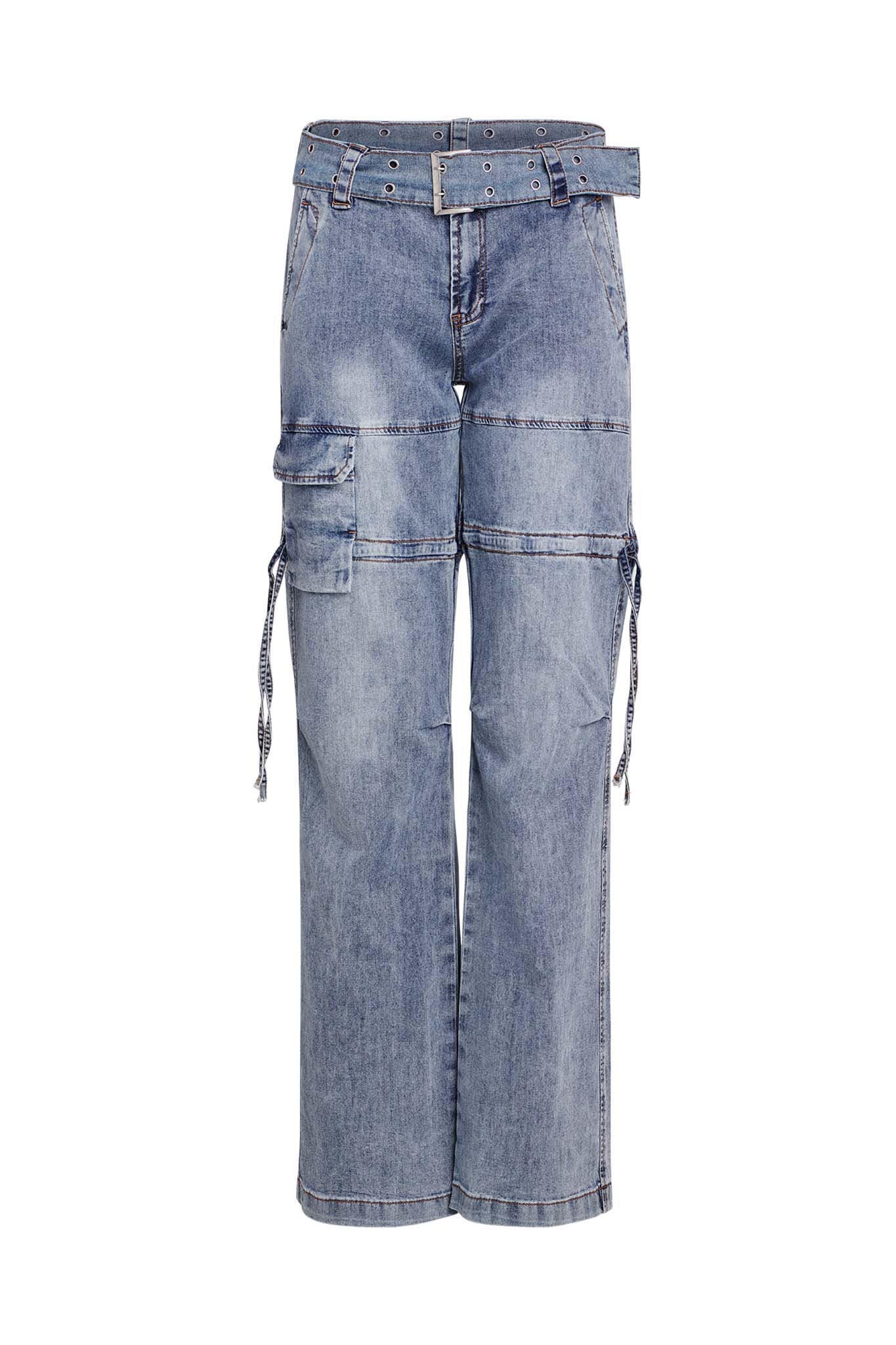 The NAIMA CARGO PANT - DENIM by I.AM.GIA includes a matching belt and features multiple pockets, including a larger cargo pocket with a flap and drawstring details on the sides. The blue denim has a faded, lightly distressed appearance.