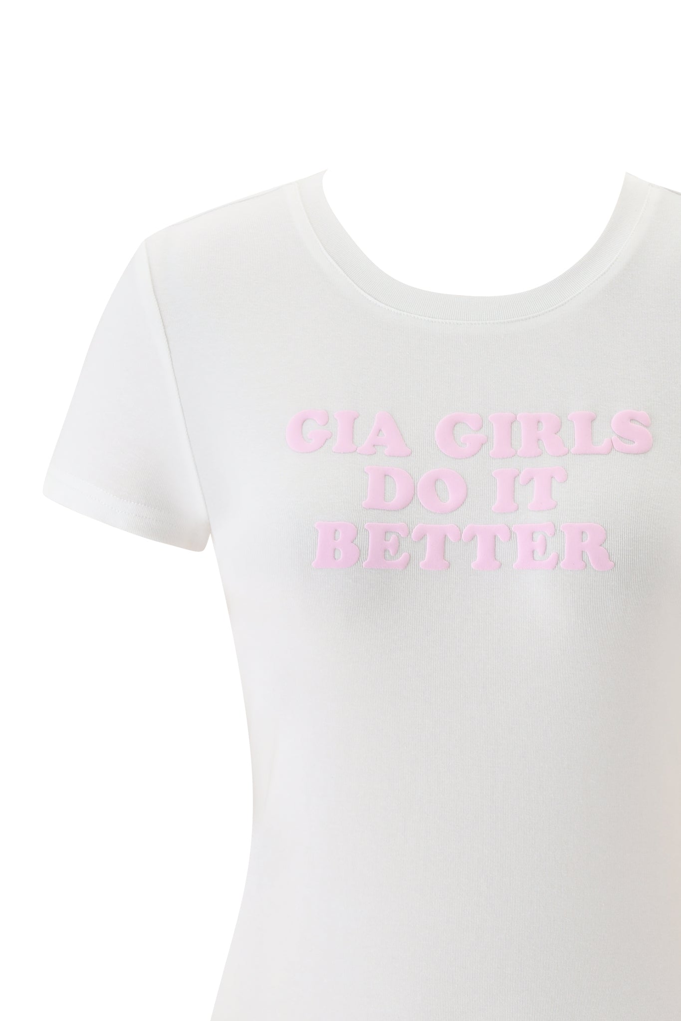 The ODEZIA TOP - GIA GIRLS by I.AM.GIA is a white short-sleeve baby tee with pink puff print text on the front that says "GIA GIRLS DO IT BETTER," shown on a plain background.