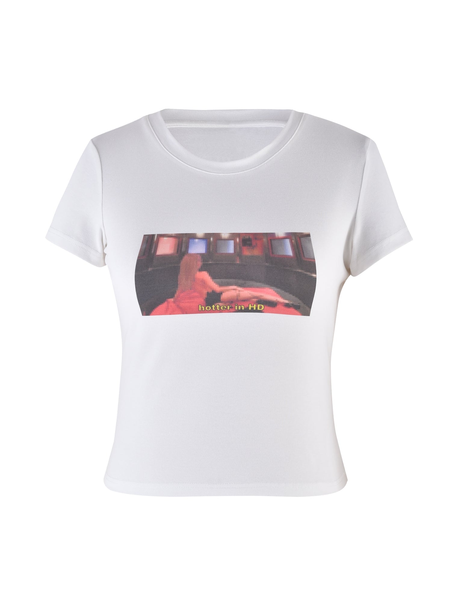 The ODEZIA TOP - WHITE by I.AM.GIA is a white short-sleeve t-shirt featuring an image with a red-toned figure in the center, presented in a distorted visual style. At the bottom of the image, there's yellow text that reads "hotter...in HD". The top has a crew neckline and a close-fitting silhouette.