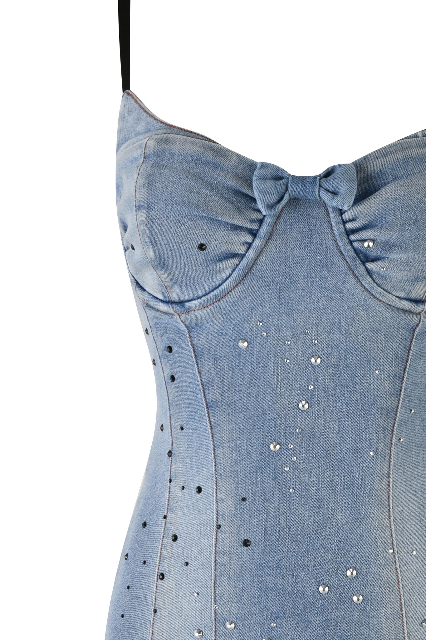Close-up of the REQUIEM DRESS - BLUE : DENIM BLUE by I.AM.GIA. This blue denim bustier top features thin black straps, a sweetheart neckline, and a small bow in the center. Adorned with sequins and diamante embellishments, the top creates a subtle sparkle effect. The fabric appears slightly faded, giving it a vintage look.