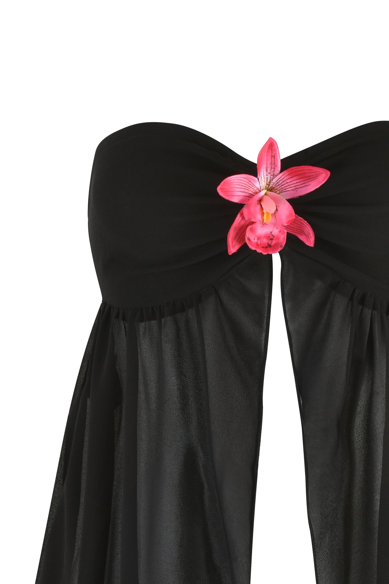 The JAYDA TOP - BLACK by I.AM.GIA is a black Georgette, strapless top adorned with a large pink orchid flower embellishment at the center. The fabric has a slight sheen and drapes elegantly, featuring a subtle sweetheart neckline.
