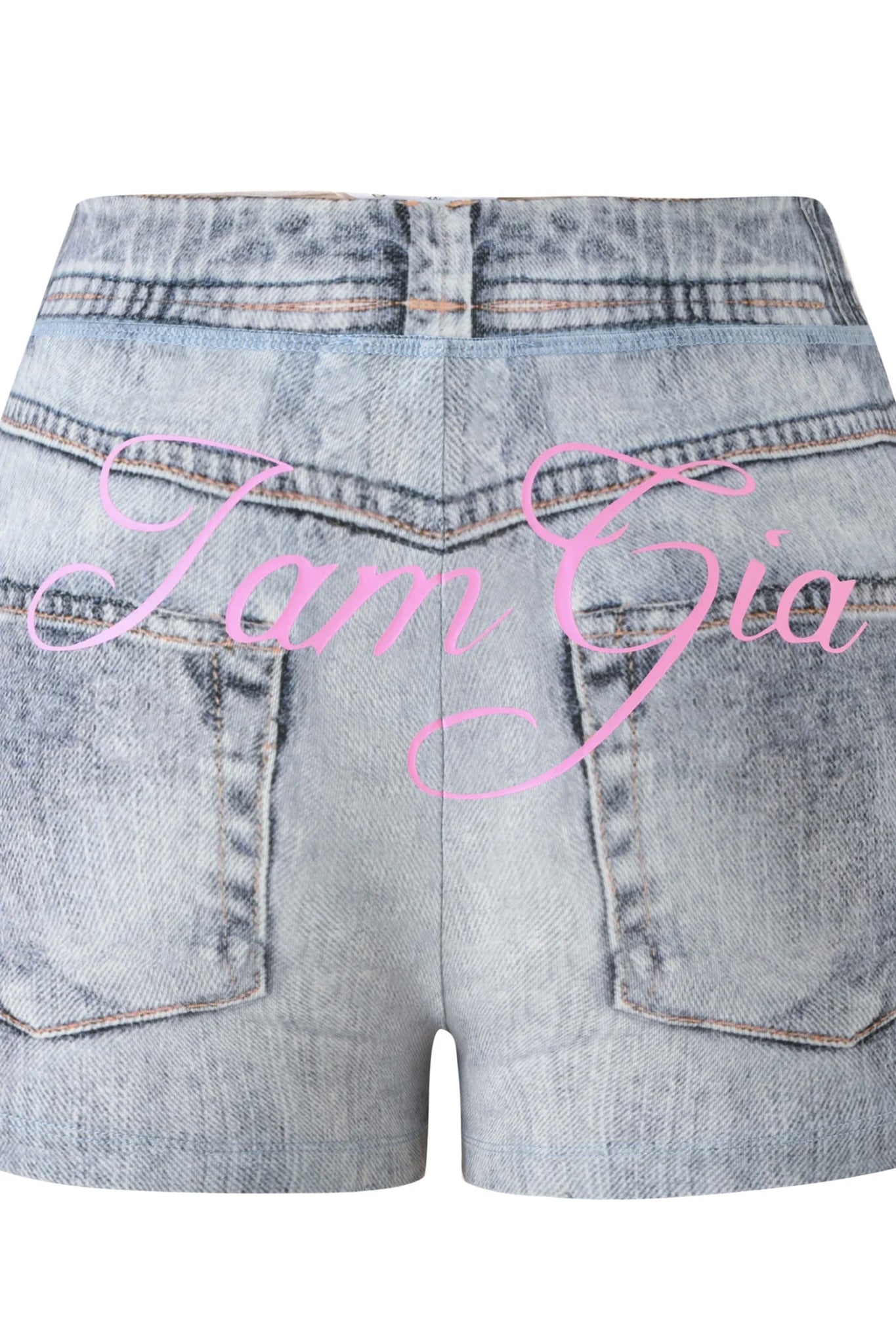 Light-wash BLARE SHORT - DENIM TROMPE L’OEIL shorts from I.AM.GIA, showcasing visible pockets and stitching, with “I AM GIA” in bold pink cursive across the back.