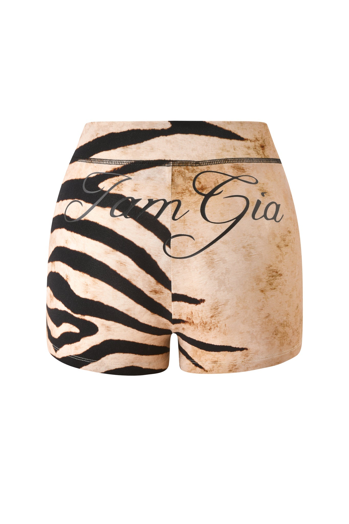 Back view of the I.AM.GIA BLARE SHORT - WILD SIDE mini shorts, showcasing a bold zebra print with a beige pattern and an elastic waistband. “I.AM.GIA” is scripted in cursive across the back, and the bodycon fit makes for a striking, statement-making look.
