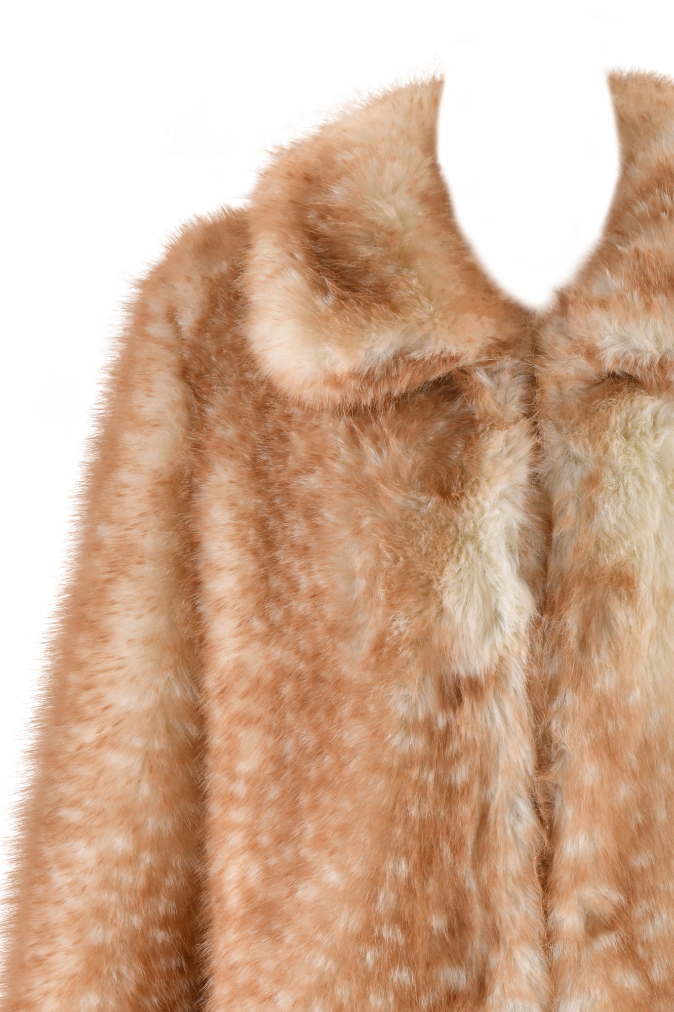Close-up of the BAMBI FUR COAT - NEUTRAL by I.AM.GIA, showcasing a luxurious, soft, faux fur coat in a relaxed fit with a light brown color and bambi deer print. It features a fluffy collar and textured fabric that highlight its plush and cozy appearance.