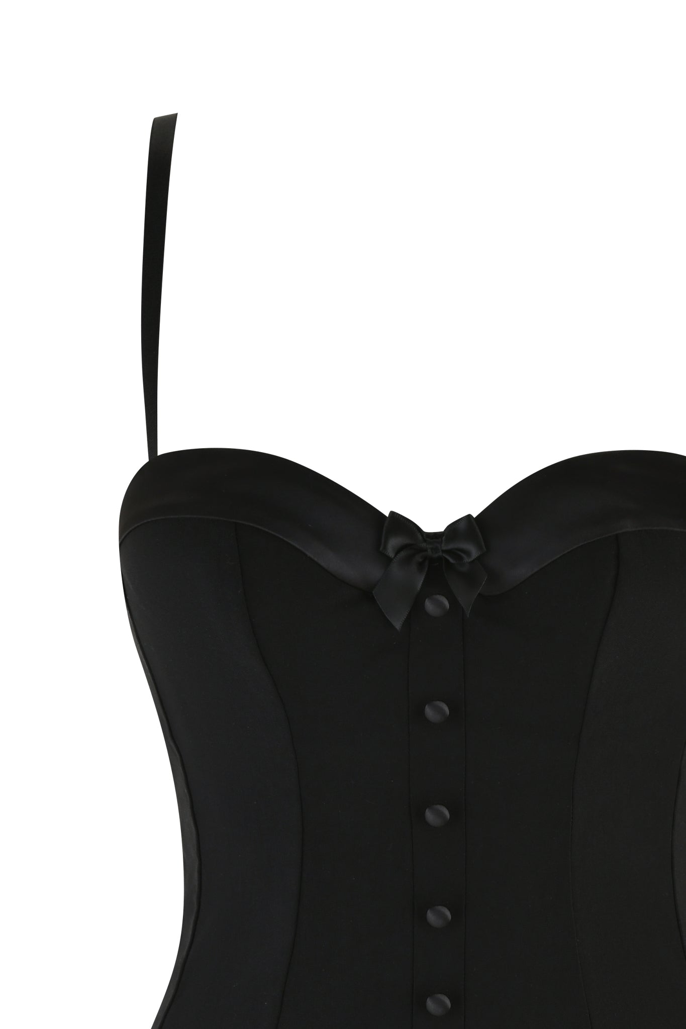 The FRANCESCA MINI DRESS in black by I.AM.GIA features a tuxedo style with thin straps, a sweetheart neckline, and button accents. Its bodycon fit is accented by a small center bow against a plain white background.