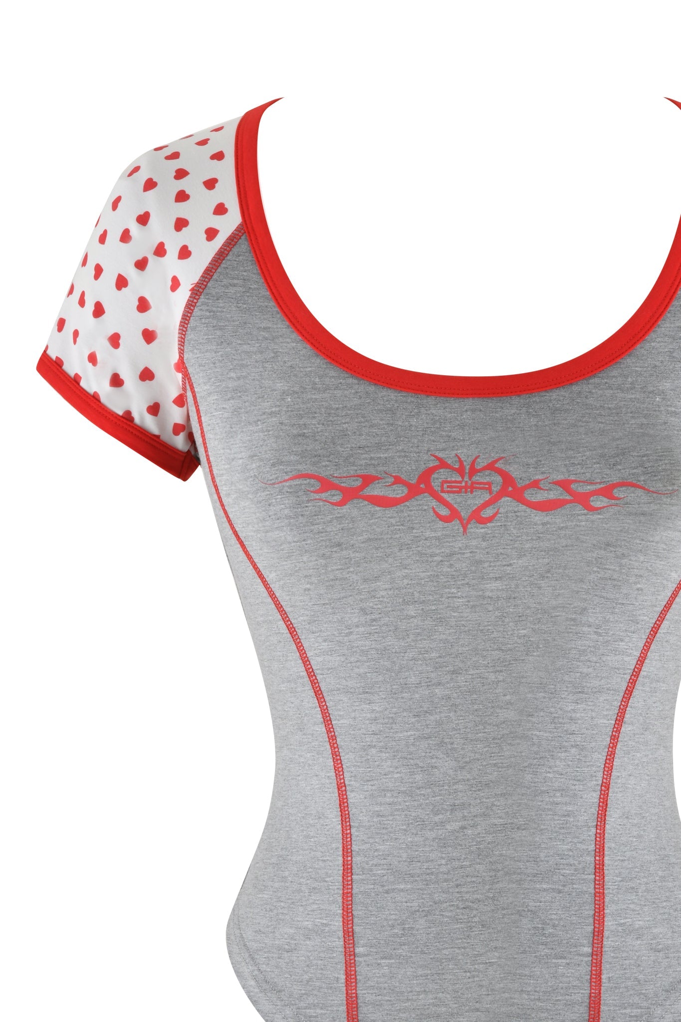 The ASHTIN TOP - GREY by I.AM.GIA showcases a gray body with red accents and exclusive GIA heart prints. A white sleeve is adorned with red hearts, complementing the tribal-style chest design. The top features a rounded neckline, red trim, and a flattering bodycon fit.