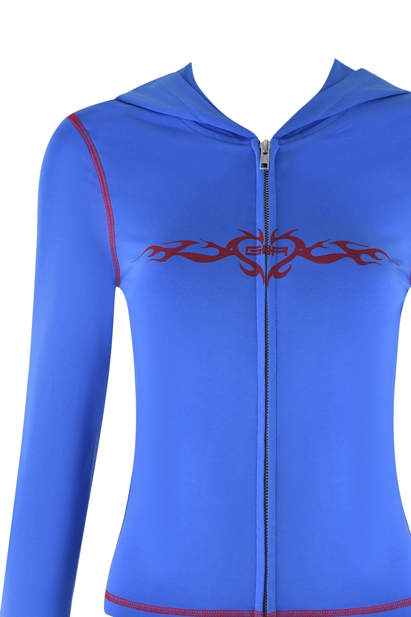 Introducing the I.AM.GIA Blare Hoodie in royal blue, a slim-fit zip-up jacket featuring a dark red tribal flame design across the chest, red stitched detailing on the shoulders and sides, all set against a plain white background.