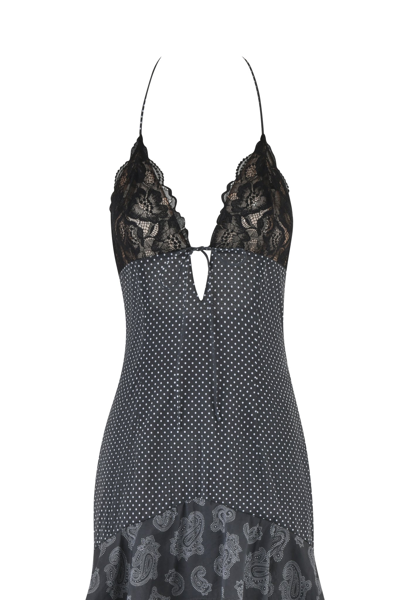 The I.AM.GIA PEARL MAXI DRESS in black features a deep V neckline with lace panels, polka dots in the center, and a paisley pattern at the bottom. It has thin straps over the shoulders.