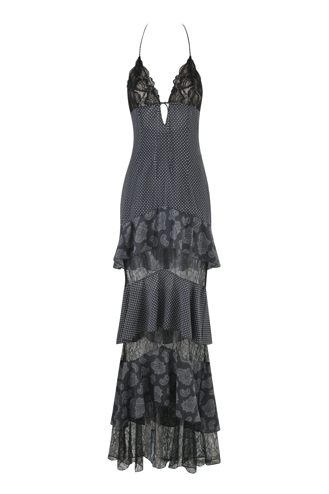 The PEARL MAXI DRESS - BLACK : POLKA DOT from I.AM.GIA is an elegant tiered halter neck dress with a fitted bodice. It features lace detailing and a skirt adorned with floral patterns and polka dots. Lace panels add intrigue, blending sheer and opaque fabrics for an enchanting ensemble.