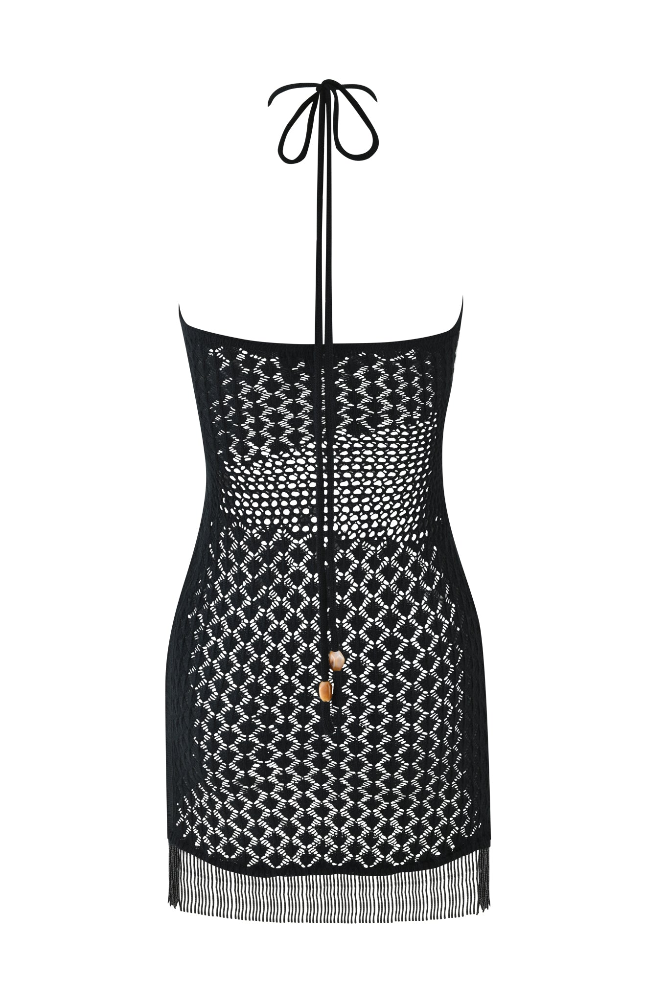 The CORALIE MINI DRESS - BLACK by I.AM.GIA is a sheer, body-con crochet mini dress with a halter neck tie, geometric mesh pattern, fringe hem, and two gold bead accents on the front tie.