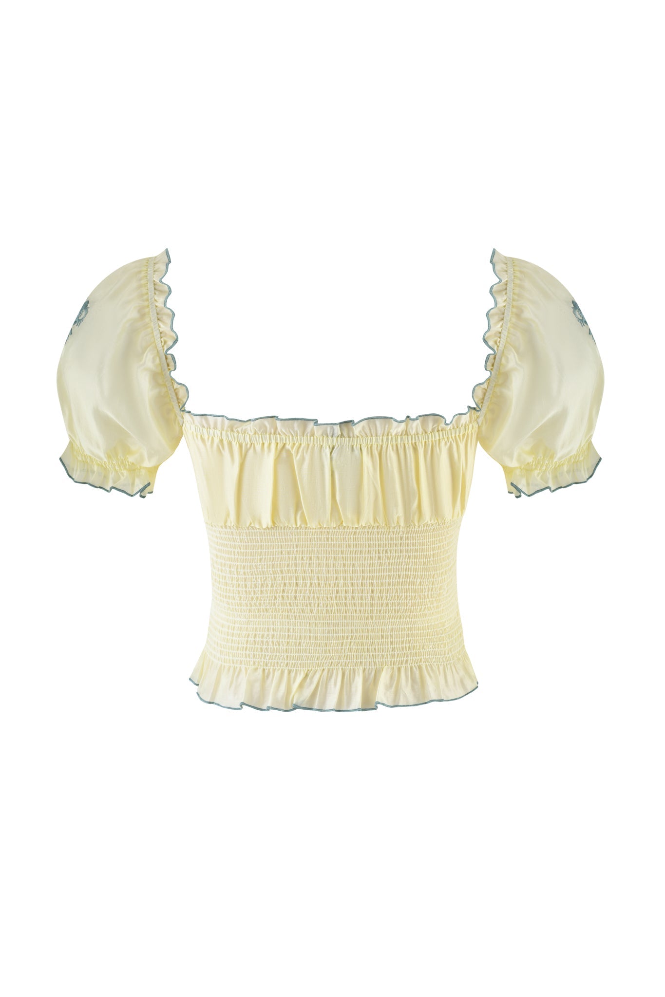 The CLOVER TOP - YELLOW by I.AM.GIA is a light yellow smocked top made of lightweight cotton. It features short puffed sleeves, a square neckline, and ruffled trim on the neckline and hem for a delicate, feminine look.