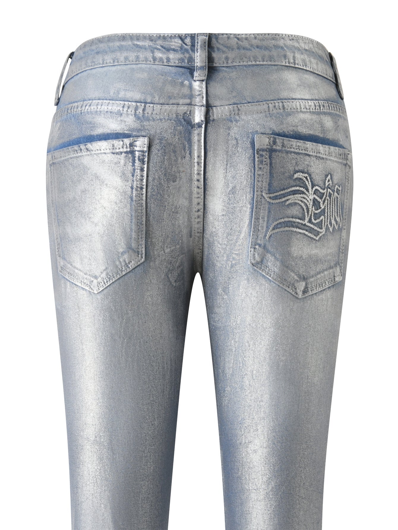 Back view of the RENATA JEAN - SILVER METALLIC WASH by I.AM.GIA, featuring two back pockets. These mid-rise straight leg jeans have a shiny, reflective metallic silver finish and a classic belted waistband. The right pocket is adorned with an embroidered detail, while the left pocket is plain.
