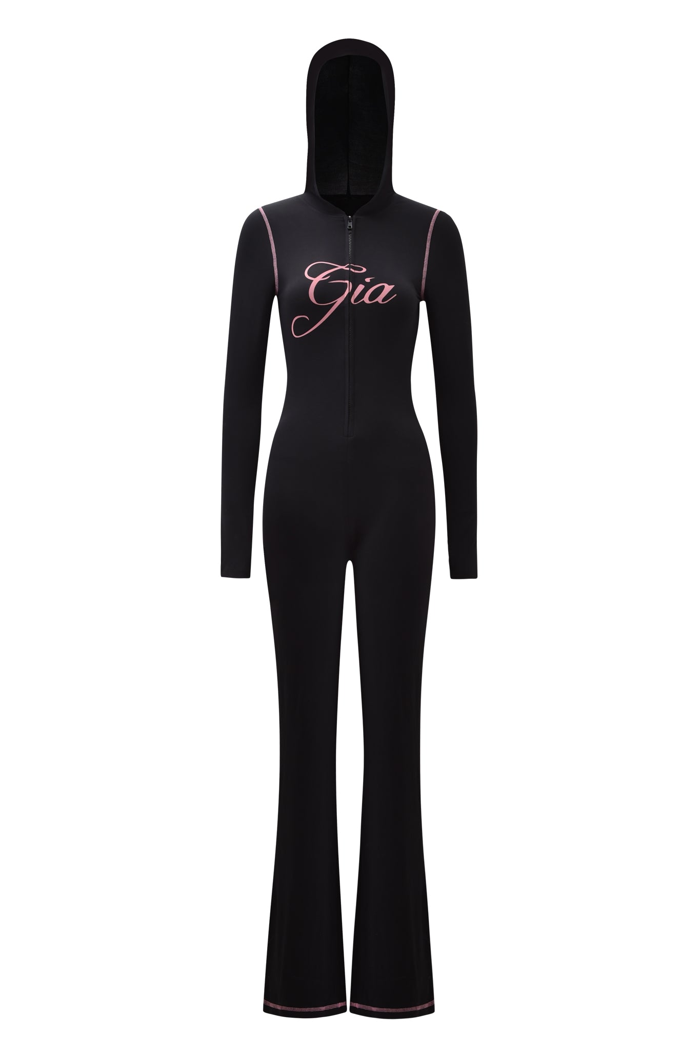 The BLARE JUMPSUIT - BLACK by I.AM.GIA features long sleeves, a hood, flared legs, a front zipper, and “Gia” in pink script on the chest with pink trim on the shoulders and cuffs for added style.
