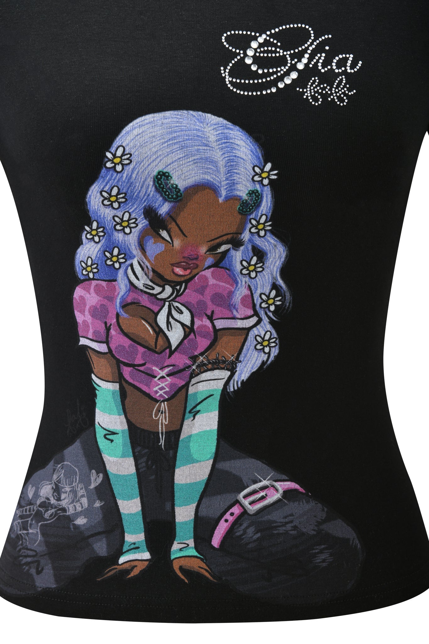 The FAFI T-SHIRT - BLACK by I.AM.GIA features an illustrated doll-like girl with lavender hair, daisy clips, a pink leopard crop top, striped green arm warmers, and diamanté "S.H.a." detail as she kneels in dark pants with a purple belt.
