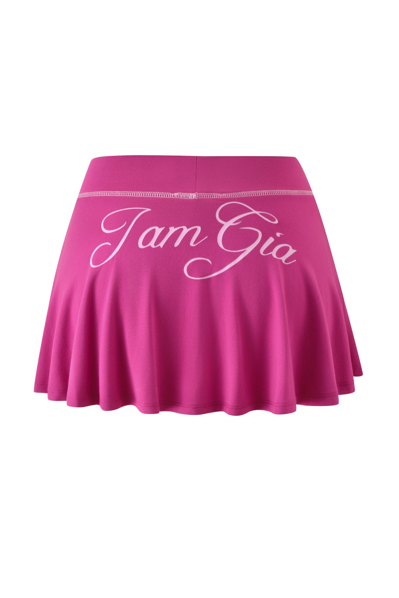 The BLARE SKORT - RASPBERRY by I.AM.GIA is a bright pink flared mini skort, featuring a smooth waistband, flowy silhouette, and bold "Tam Gia" cursive print across the front.
