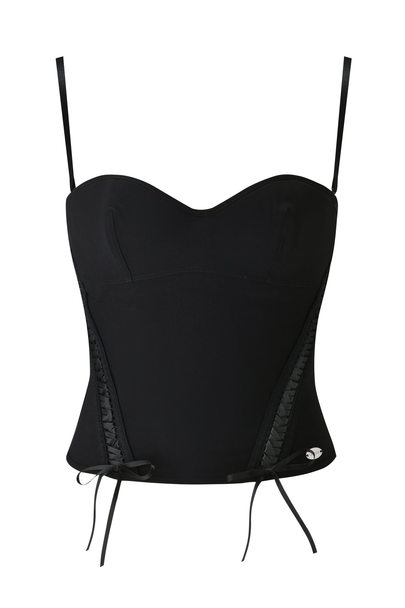 The SAMIRA BUSTIER - BLACK by I.AM.GIA features a fitted, lingerie-inspired design with thin straps, a sweetheart neckline, corset-style side lacing, smooth fabric, and a small silver logo at the lower left.
