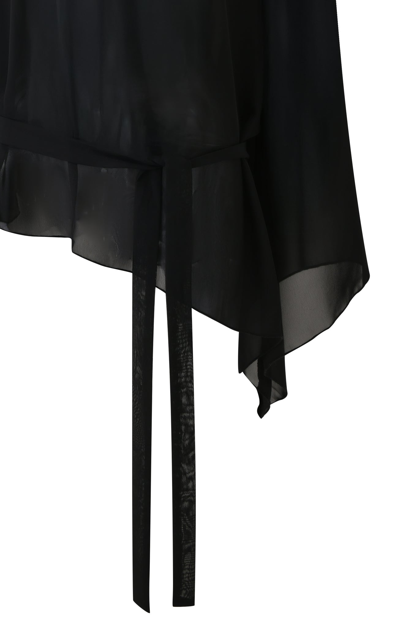 Close-up of the MALINA LONG SLEEVE PONCHO TOP by I.AM.GIA: a black sheer top with flowing texture, long bell sleeves, a tied waist belt, and an asymmetrical hemline.