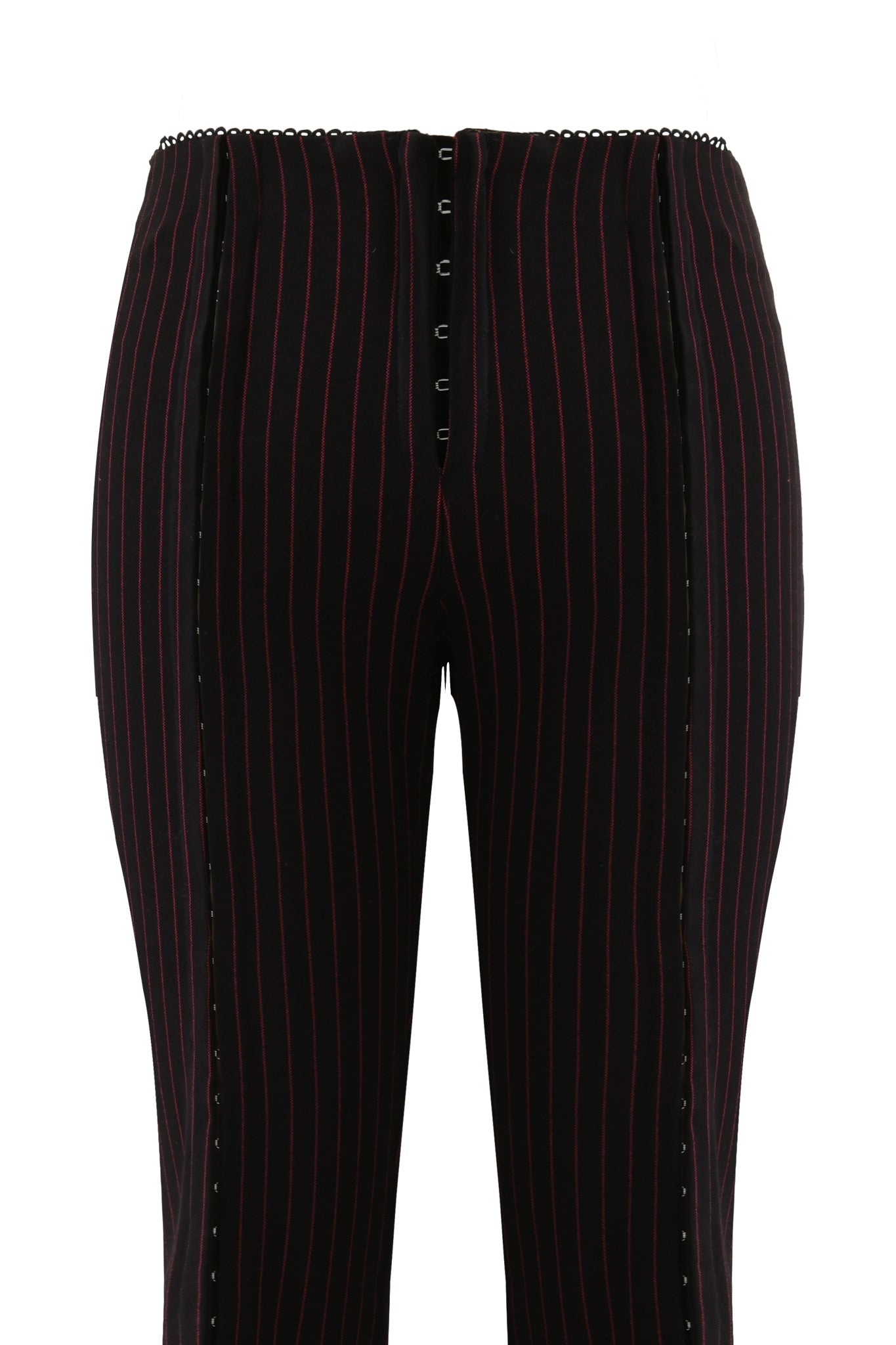 The RONAN PANT by I.AM.GIA features a high waist, black fabric with thin red pinstripes, straight leg fit, front button closure, and decorative side stitching for a bold look.