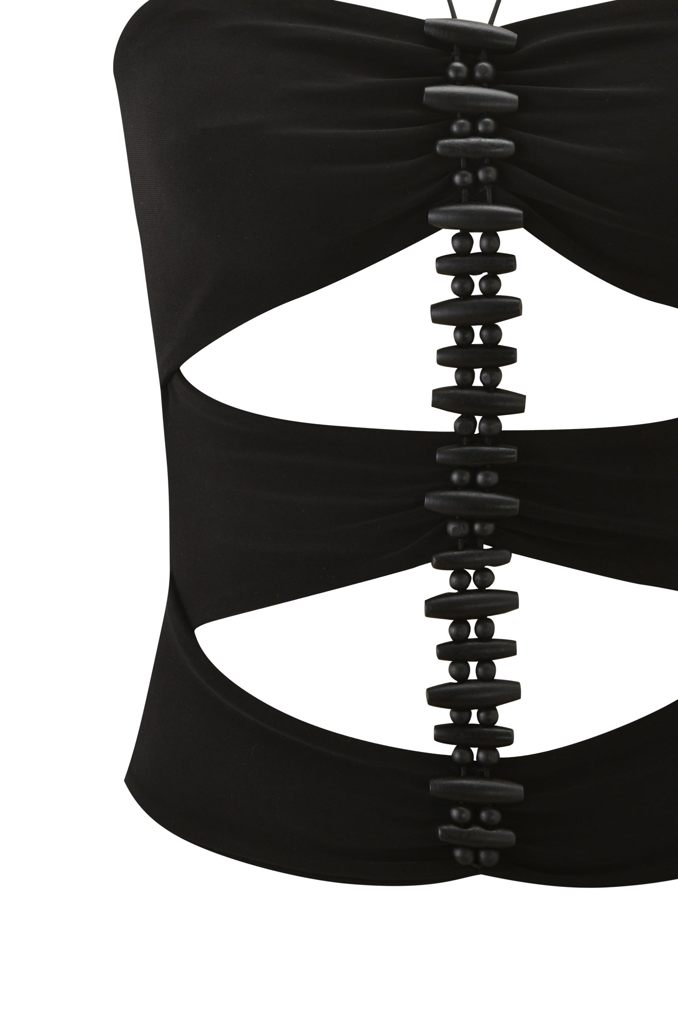 The FENNICK TOP - BLACK by I.AM.GIA features a bodycon fit with horizontal cut-outs and a central row of black cylindrical beads connecting the fabric sections.