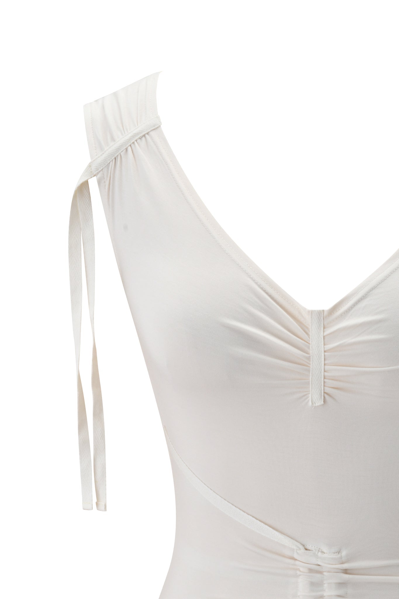 Close-up of the ASHA TOP in cream by I.AM.GIA, a sleeveless bodycon fit top featuring a deep V-neck, gathered bust detail, and a long tie on one shoulder. Set against a plain white background.