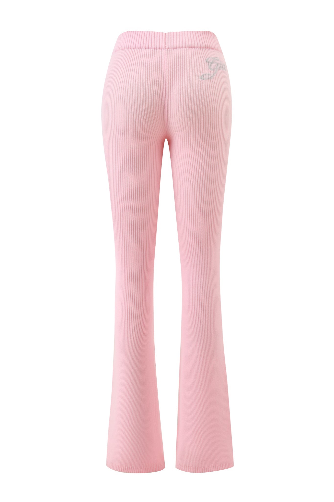 Back view of the I.AM.GIA BLARE KNIT TRACKPANT - PINK, showcasing a ribbed design, flared leg, comfortable mid-rise waistband, and a small graphic accent on the right hip.