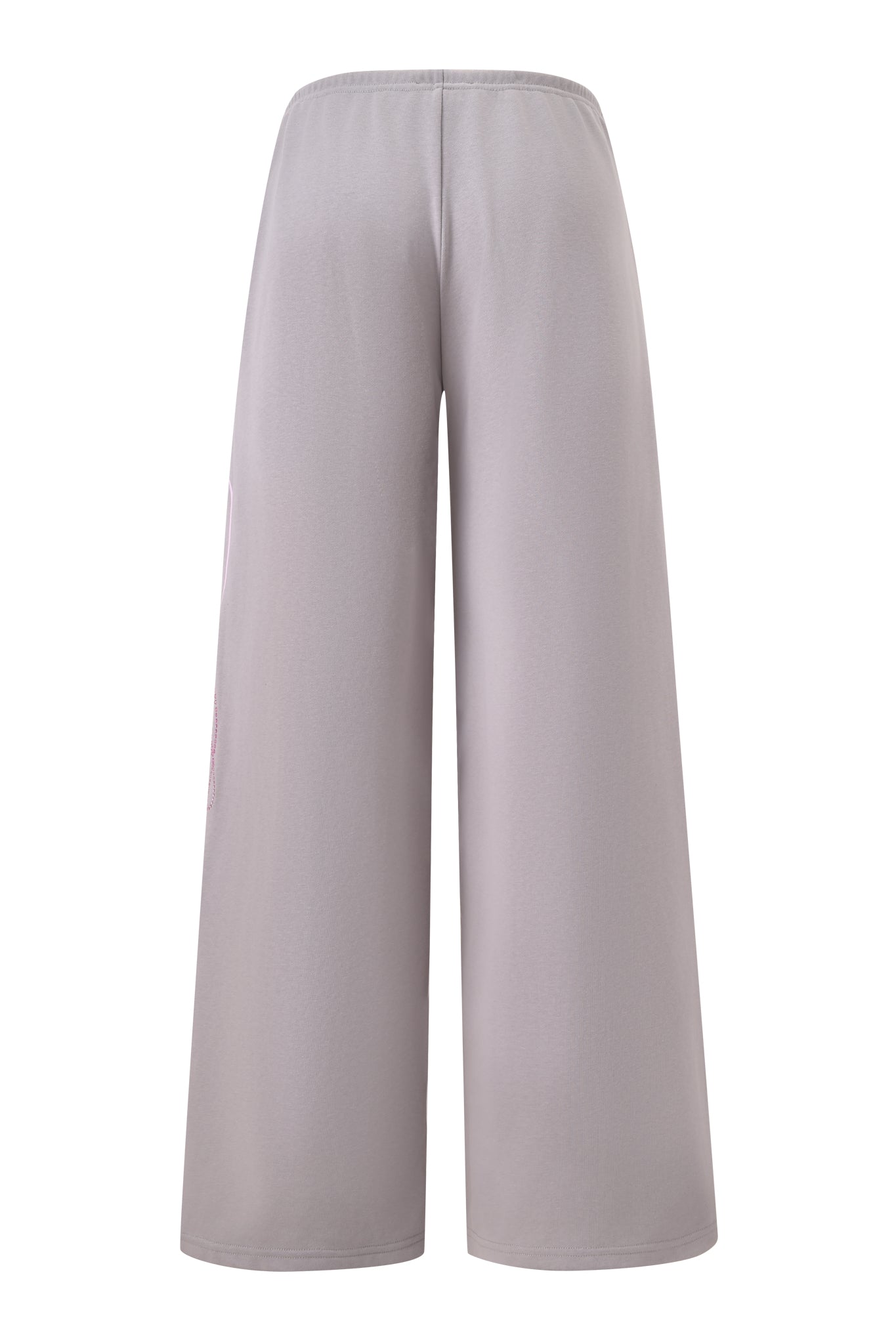 The KADE PANT - GREY by I.AM.GIA is a light gray wide leg sweatpant with an elastic waistband, loose low-rise fit, smooth texture, and no visible pockets or embellishments, shown from the back.
