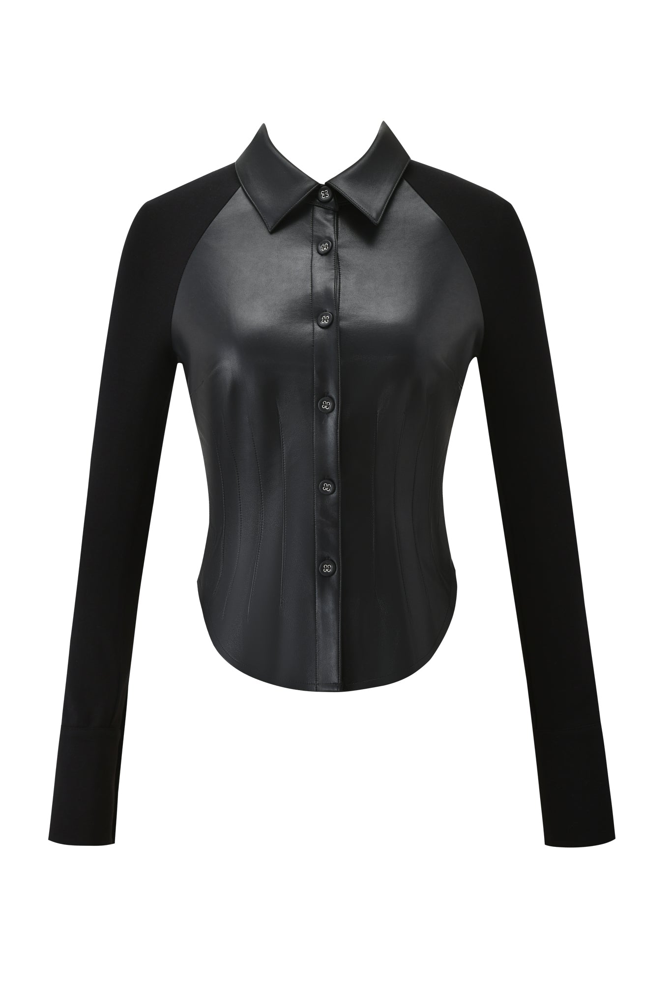The HELIX TOP - BLACK by I.AM.GIA is a bodycon blouse with a button-down front, pointed collar, and fitted waist. It features a black faux leather front panel with contrasting matte fabric sleeves and back.