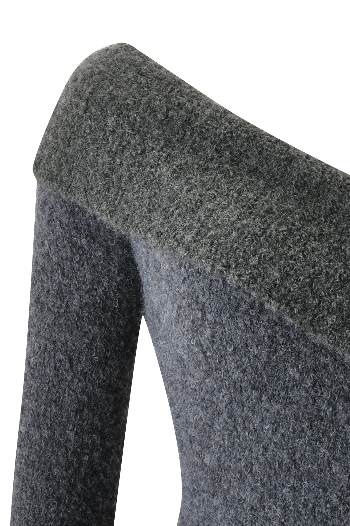 Close-up of a modern chair upholstered in textured, dark gray fabric that resembles the ARLEN KNIT TOP - STEEL by I.AM.GIA, focusing on the corner where the backrest meets the arm.