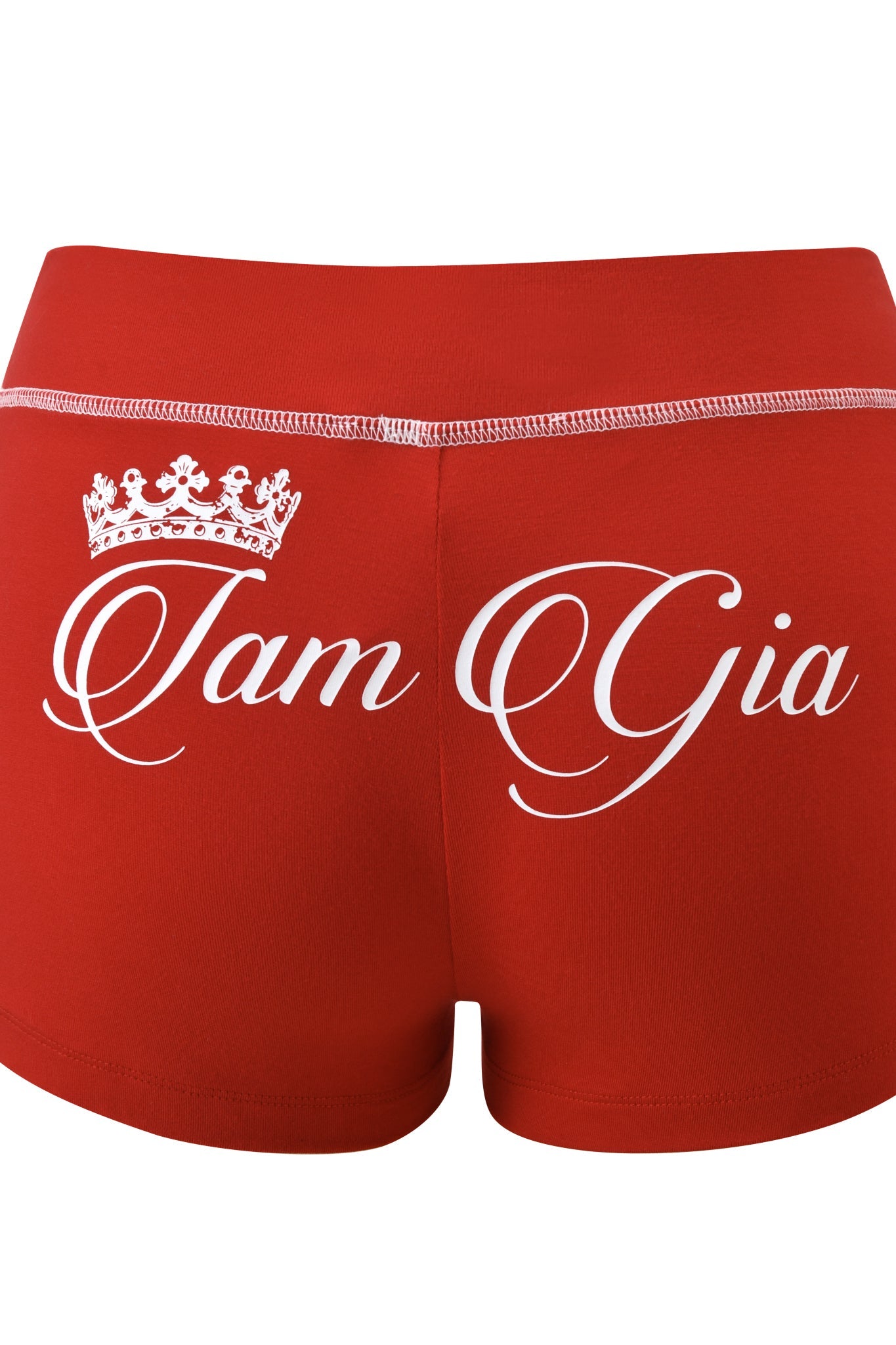 The I.AM.GIA BLARE BAMBOO PANELLED SHORT in red features white stitching, a white crown graphic, and "Tam Gia" cursive script across the back for a sporty, micro short style.