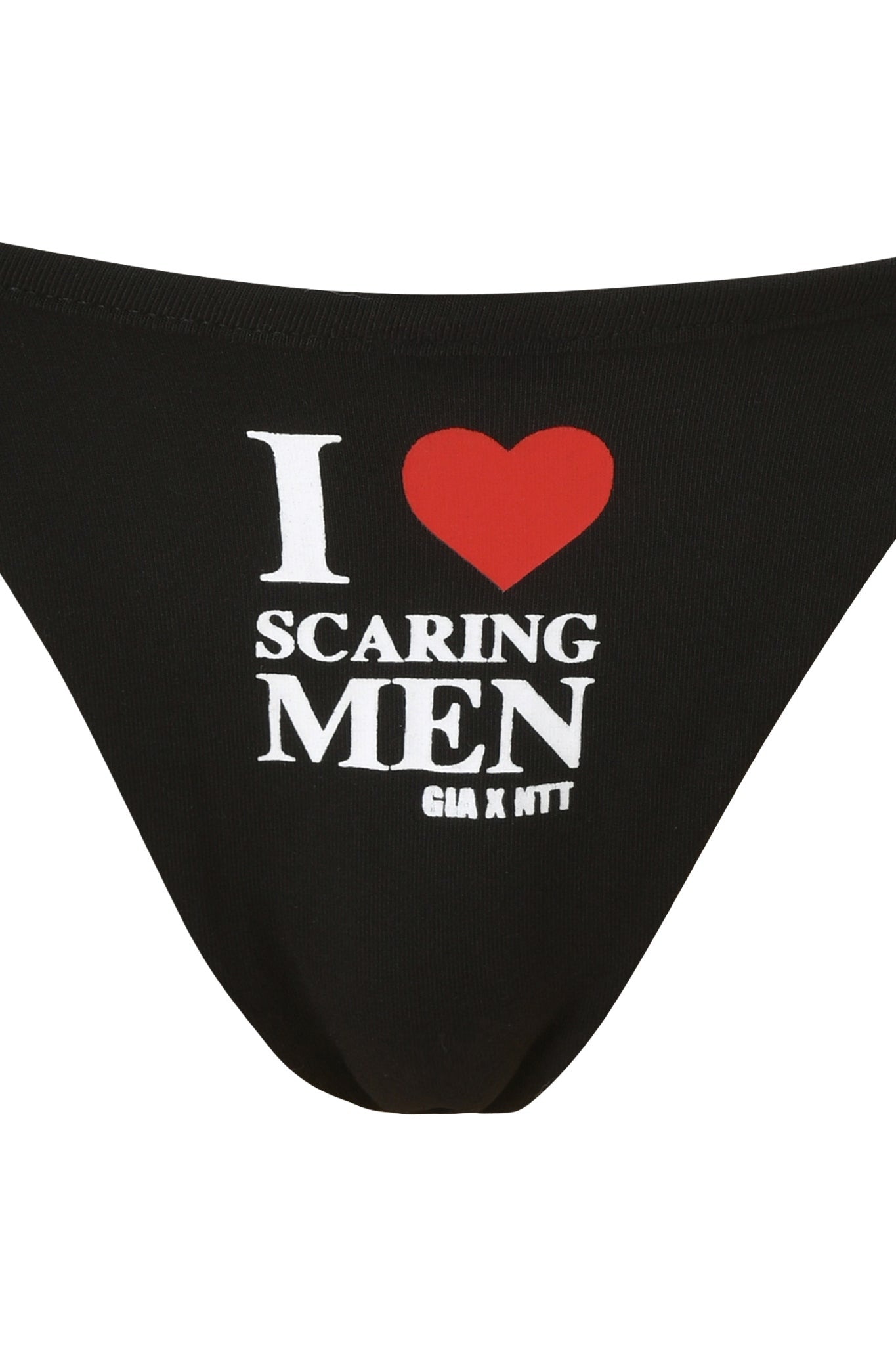 The POLINA G-STRING - SCARING MEN by I.AM.GIA is a black micro thong featuring bold white and red "I ♥ SCARING MEN GIA X NTT" print on the front, crafted in the brand's signature style.