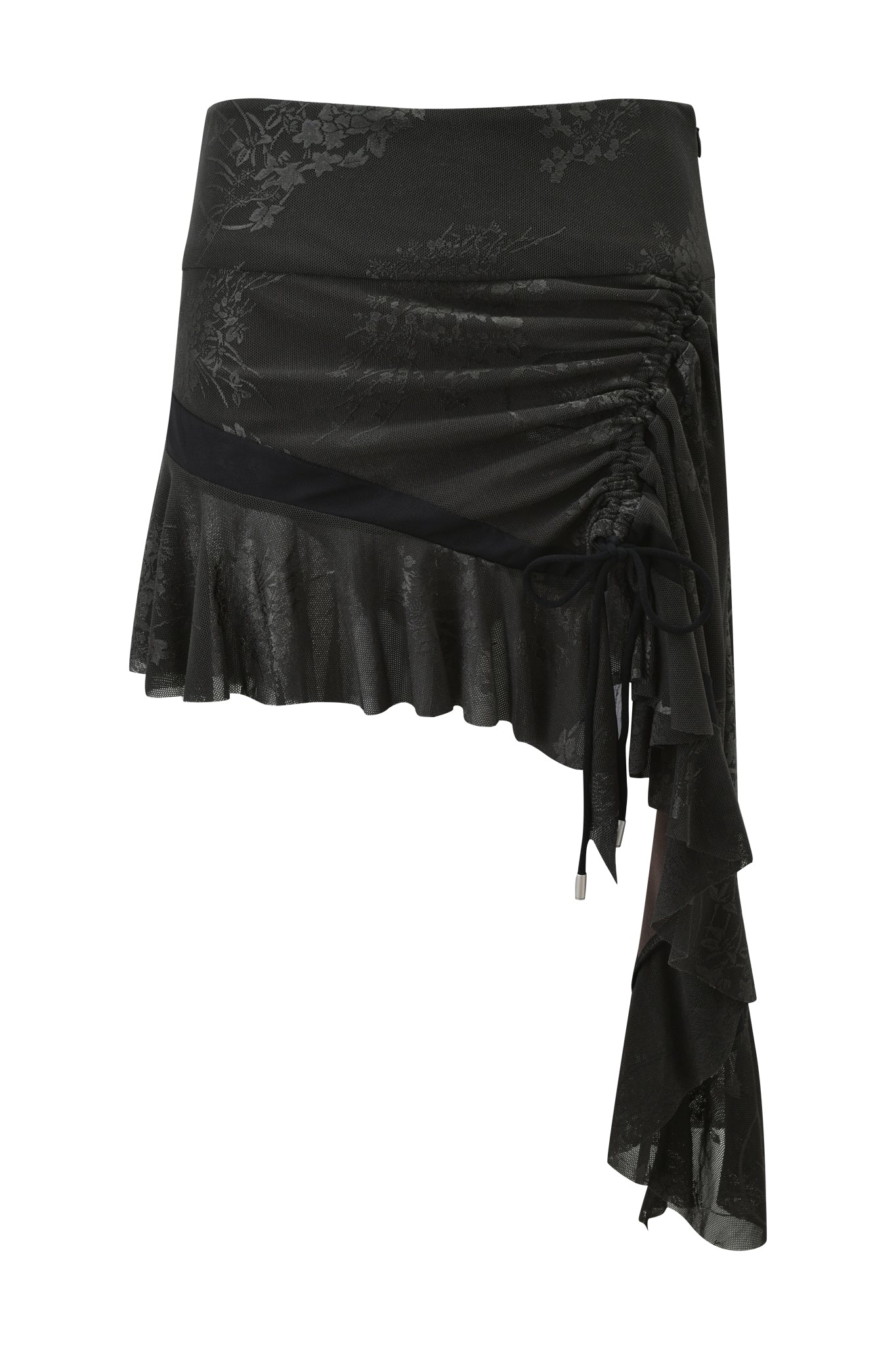 The ISOLAE ASYMMETRICAL MINI SKIRT - BLACK by I.AM.GIA is a jacquard mesh mini skirt with a subtle floral pattern, ruched side detail, and an asymmetrical ruffled hem.
