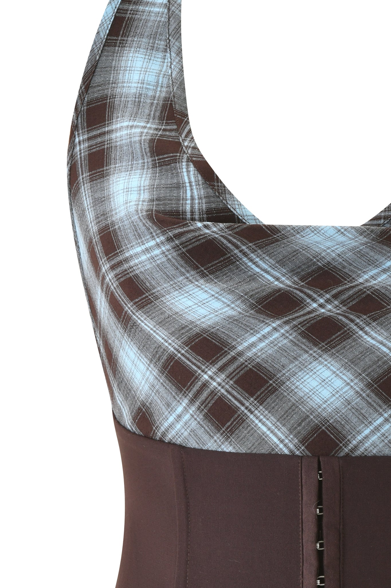 A close-up of the ROUX COWL CORSET - BLUE PLAID by I.AM.GIA, featuring a sleeveless flannel plaid cowl neck halter top and a solid brown fitted bodice with corset waist panel and hook-and-eye closures.