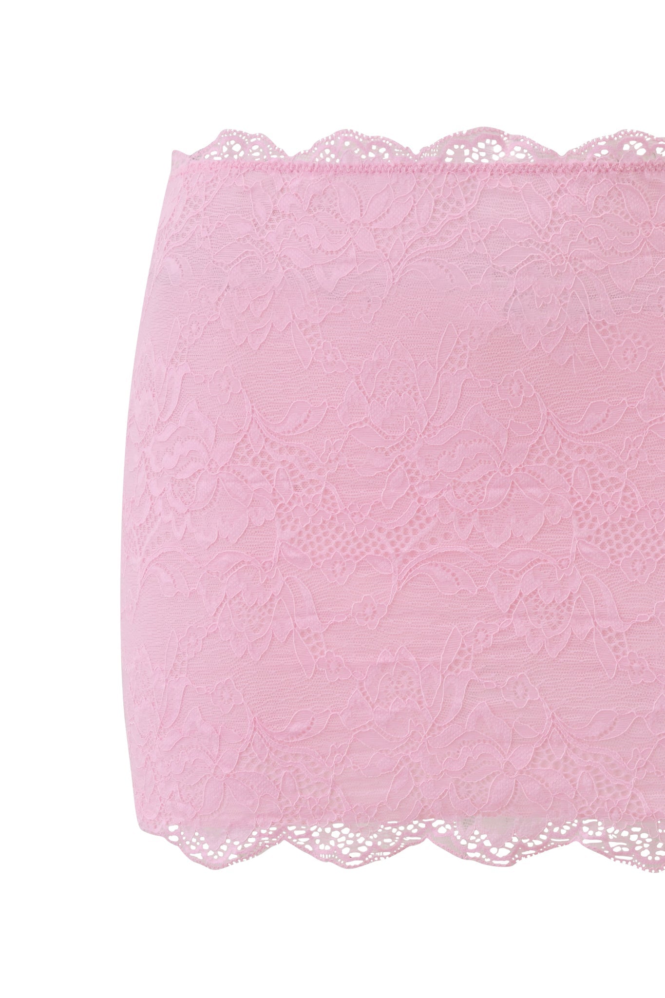 The SALLI LACE MINI SKIRT in baby pink by I.AM.GIA looks stunning with a pink floral lace bandeau or your favorite swim coverup, making it a versatile choice for any summer outing.