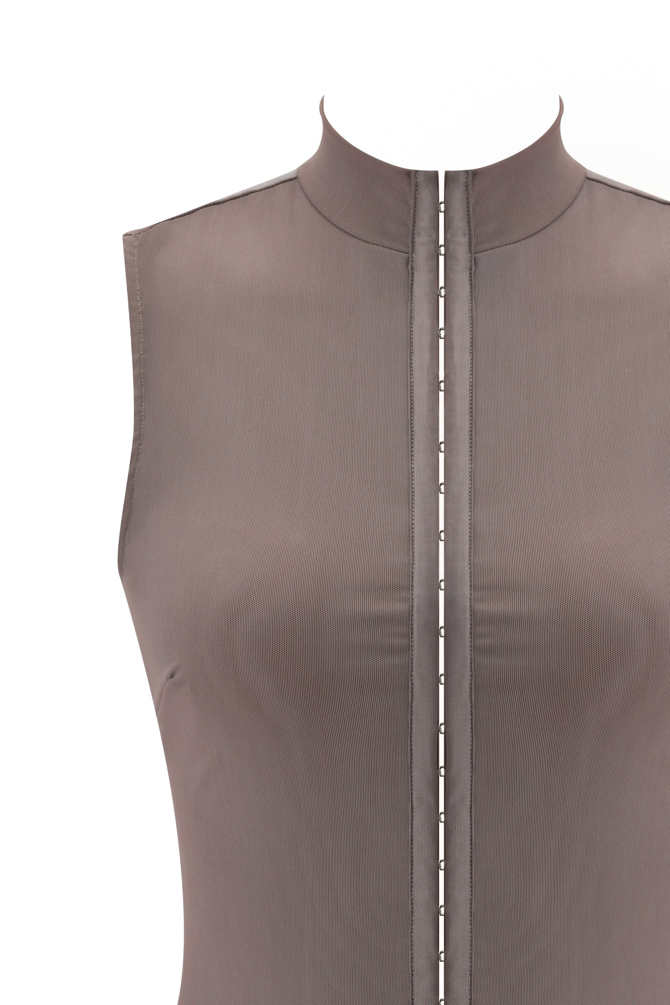 The I.AM.GIA ISELA TANK TOP in mocha features a sleeveless mock neck, bodycon fit, sheer taupe fabric, and vertical front seam detail, shown on a mannequin against a white background.