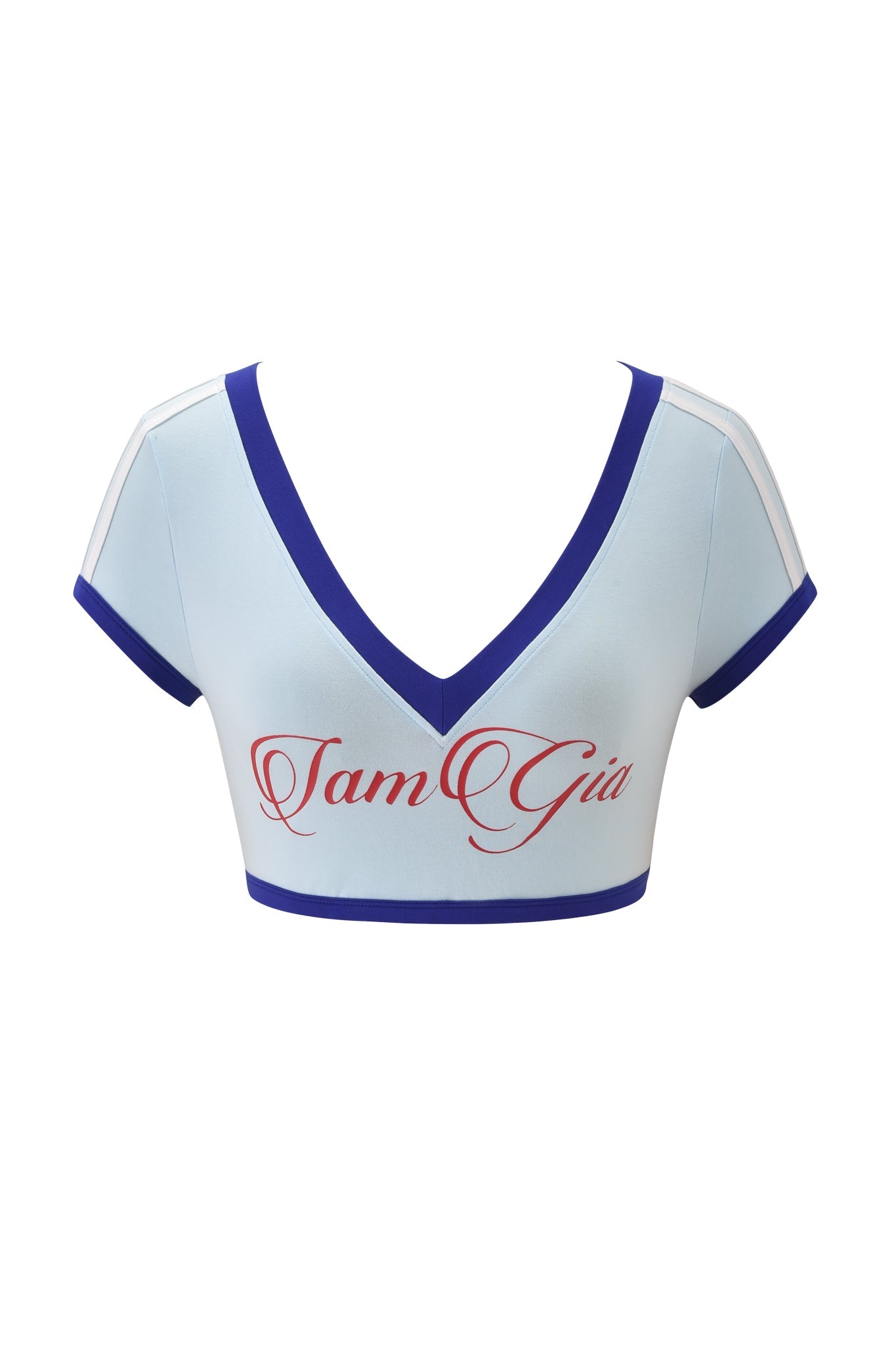 The I.AM.GIA BLARE SPORT CROP TEE AND HEADBAND in baby blue features a sporty v-neck, short sleeves, contrasting deep blue trim, and "Tam Gia" printed in red script on the chest.