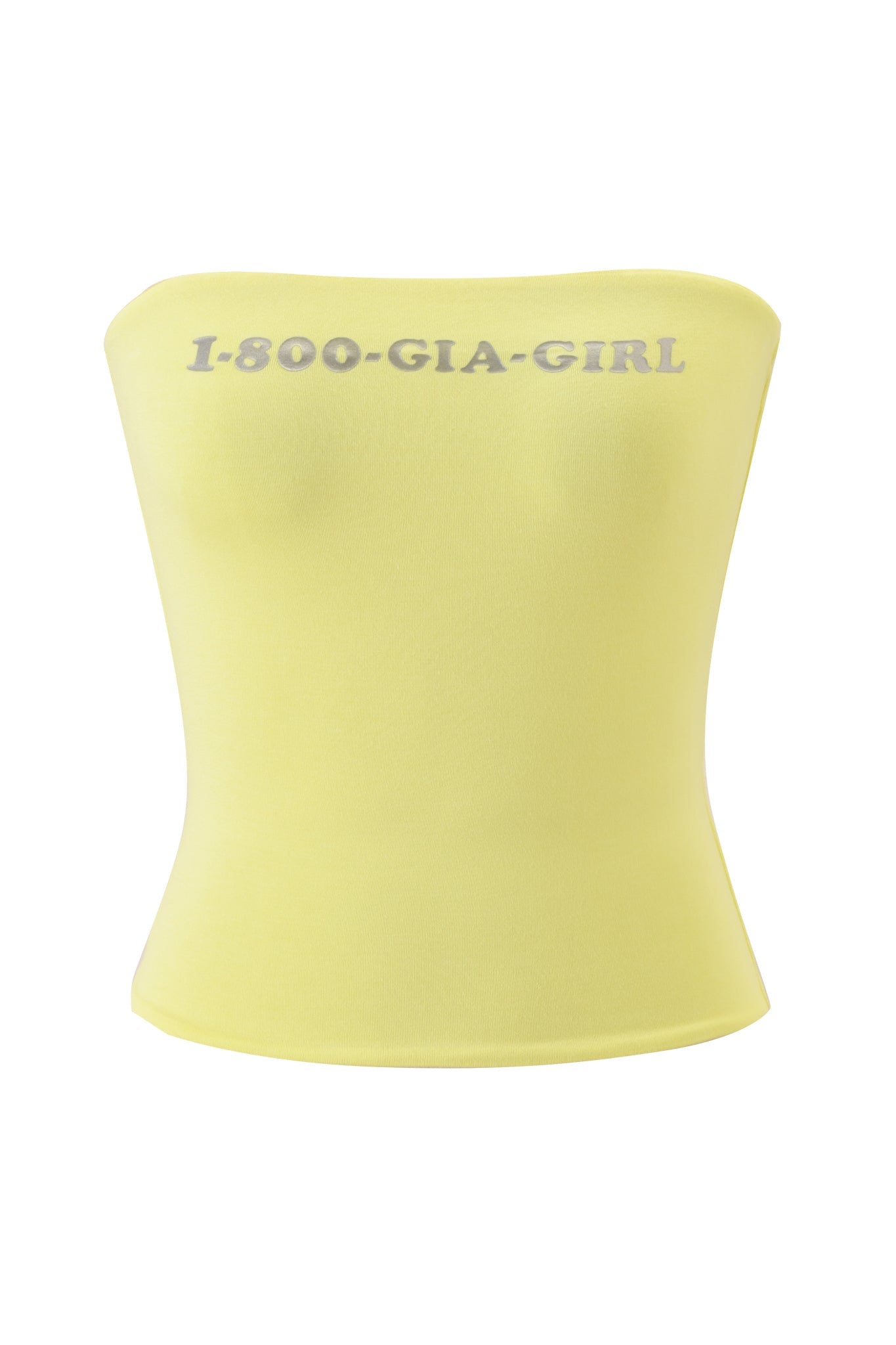 The NESSY BOOB TUBE - GIA GIRL by I.AM.GIA is a strapless, light yellow tube top with "1-800-GIA-GIRL" in silver letters across the chest, shown on a plain white background.