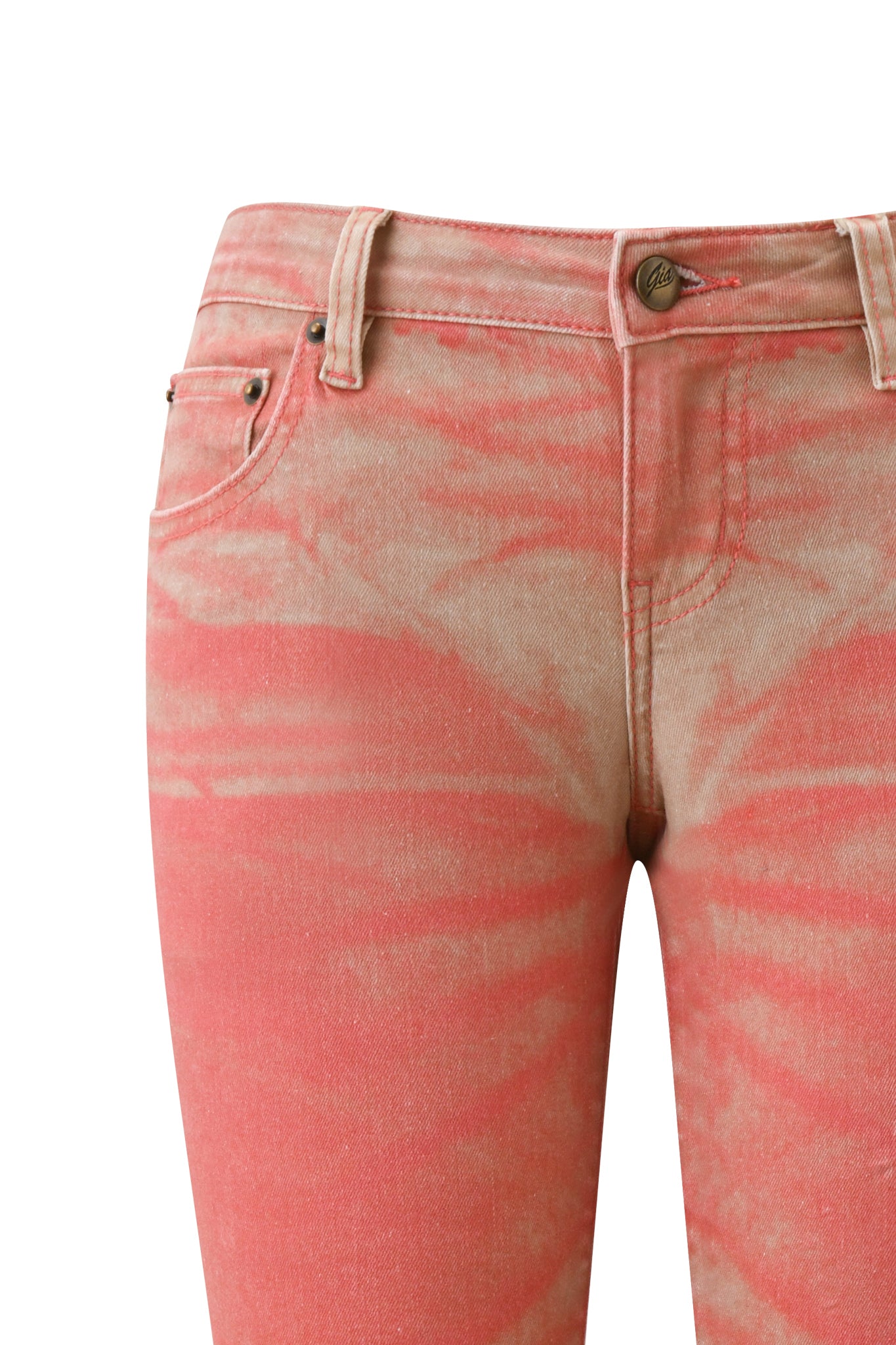 Close-up of the SUNSET CAPRI JEAN - PEACH by I.AM.GIA, featuring a coral and beige peach ombré wash, button closure, belt loops, and visible front pockets against a white background.