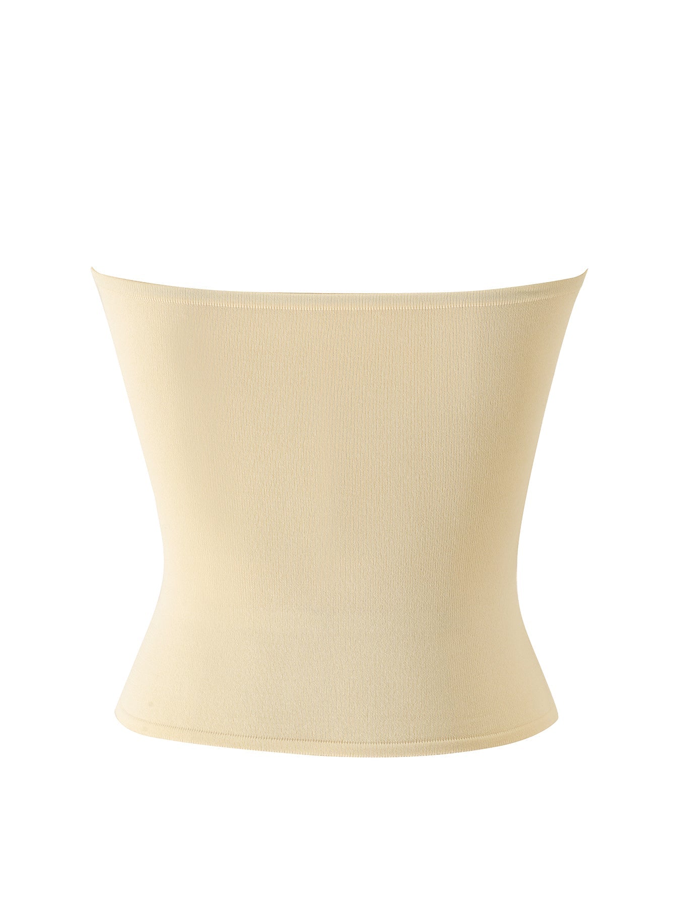 The I.AM.GIA ZENDAYA KNIT TUBE TOP in cream is displayed on a white background, highlighting its seamless construction and smooth texture that hugs the waist and torso for a flattering shape. This versatile tube top combines the discreet support of shapewear with the comfort of a bodycon knit, offering a stylish strapless design perfect for layering under any outfit.