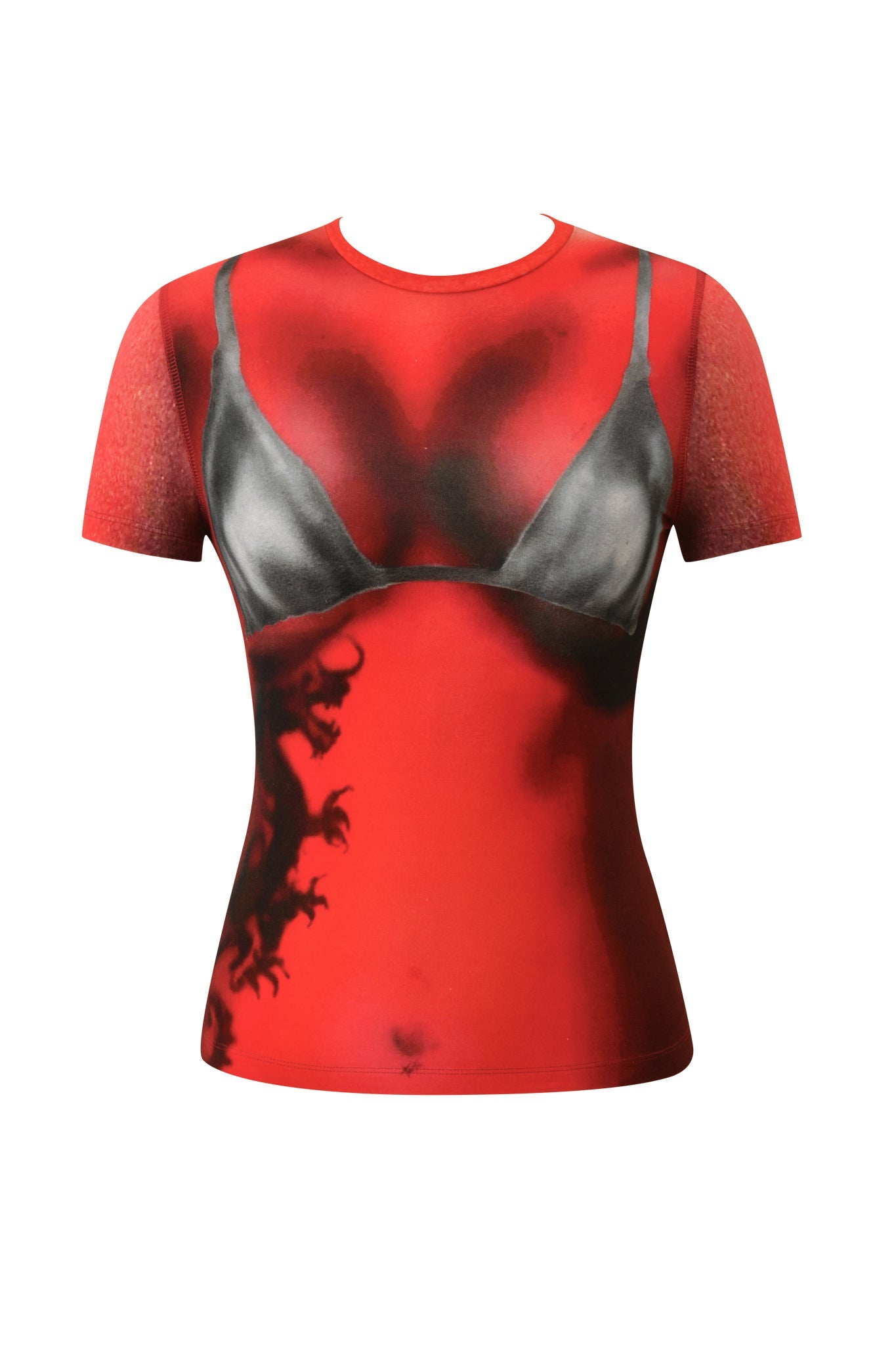 The I.AM.GIA T-REX SPRAY BIKINI BLARE TEE in red is a short-sleeve shirt with a Y2K-inspired airbrush bikini print, showcasing a black bra and dark abstract shapes on the torso. It is displayed against a plain white background.