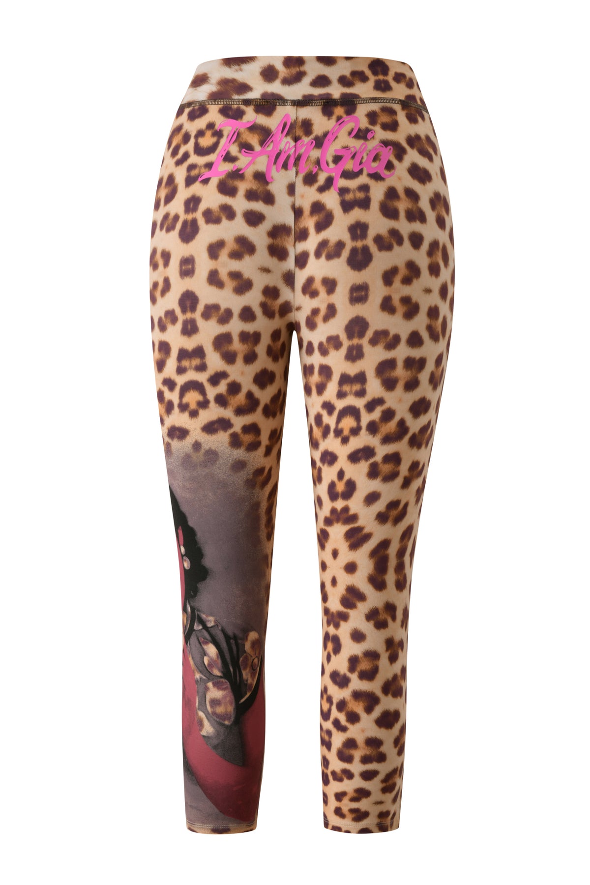 The I.AM.GIA T-REX BLARE CAPRI - WILD CARD features a vibrant leopard print, a pink "FEMGIA" logo at the waistband, and a graphic illustration of a woman wearing glasses on the left thigh, echoing the bold aesthetic of trending capri pants and signature I.AM.GIA Blare styles.