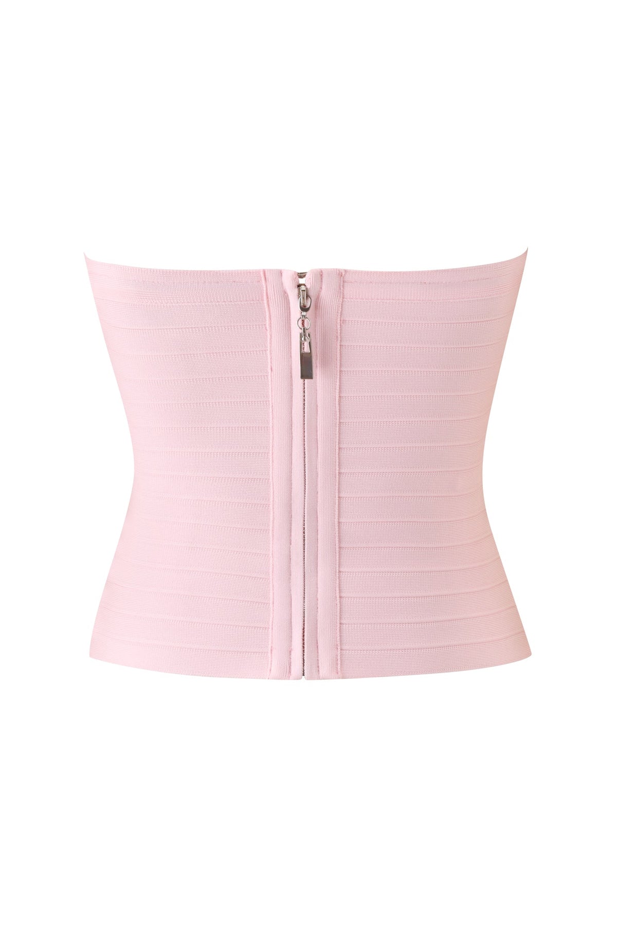 The MAEVE BANDAGE TOP - BABY PINK by I.AM.GIA is a strapless tube top waist trainer in light baby pink, designed with horizontal ribbing and a central front zipper closure. Displayed against a white background, this chic bodycon top seamlessly blends shaping support with stylish elegance for the perfect date night look.