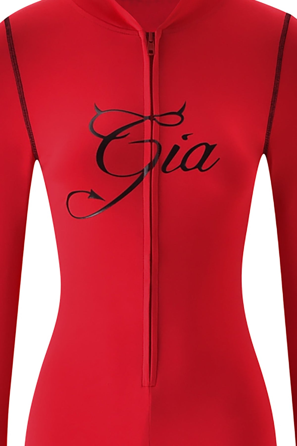 A close-up of the BLARE HORN JUMPSUIT - RED by I.AM.GIA, featuring black cursive lettering with devil horns and a tail inspired by the brand’s signature style.