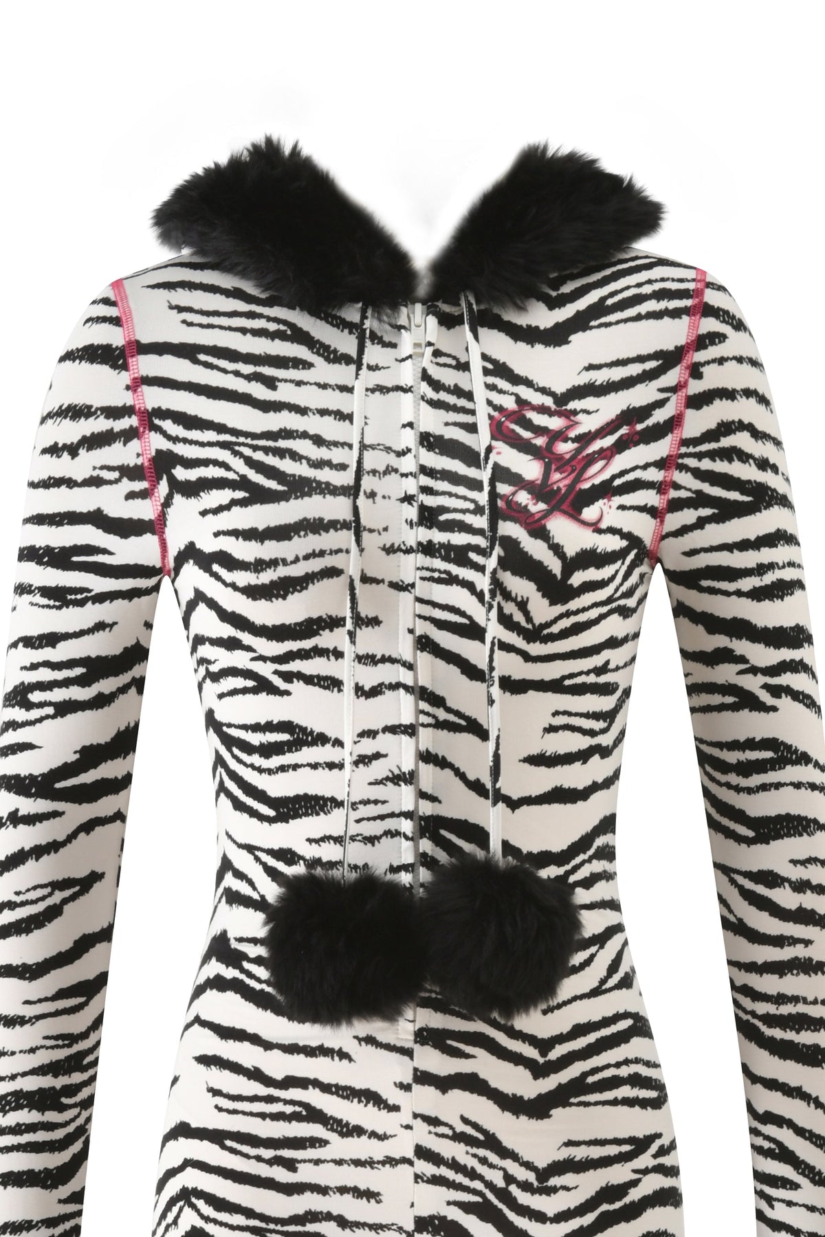 The YVL BLARE FUR LINED JUMPSUIT - ZEBRA features a black faux fur-lined hood, a front zipper, and two black pom-poms on the drawstring.